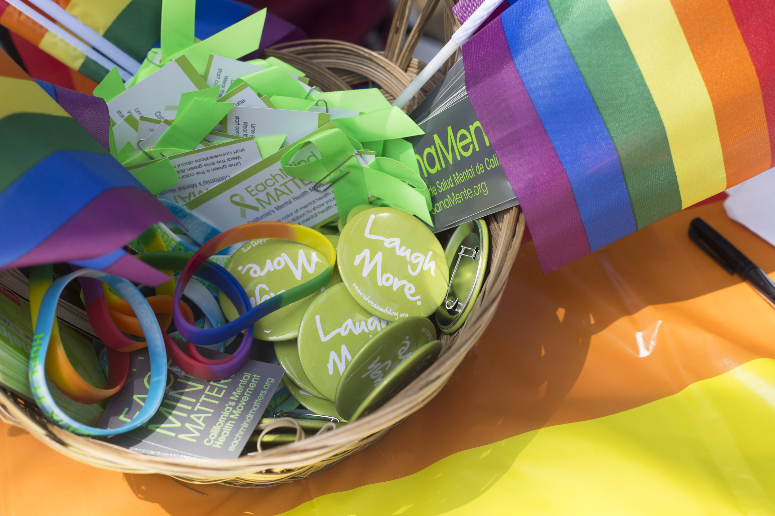  Basket full of souvenirs guests could take home with them after attending the sSanta Monica College pride week event on main campus, Tuesday May 15. Tables we full of accesories, bracelets, pride flags, and buttons. Santa Monica College. Santa Monic