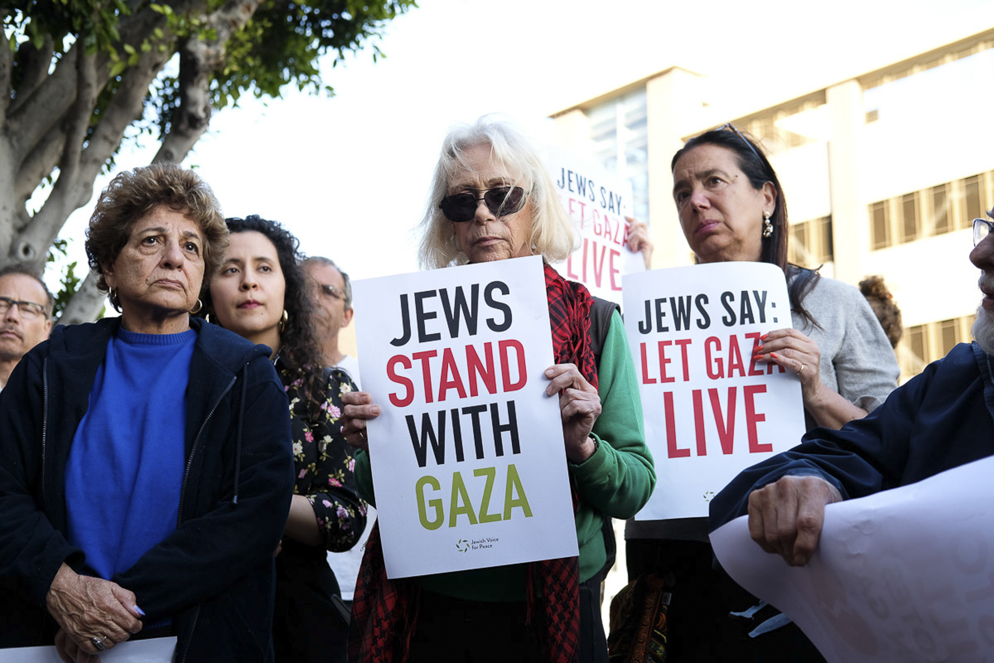  Attendees hold signs and listen in at the Vigil for Gaza in Santa Monica, California on May 18, 2018.  (Jayrol San Jose/Corsair Contributor) 