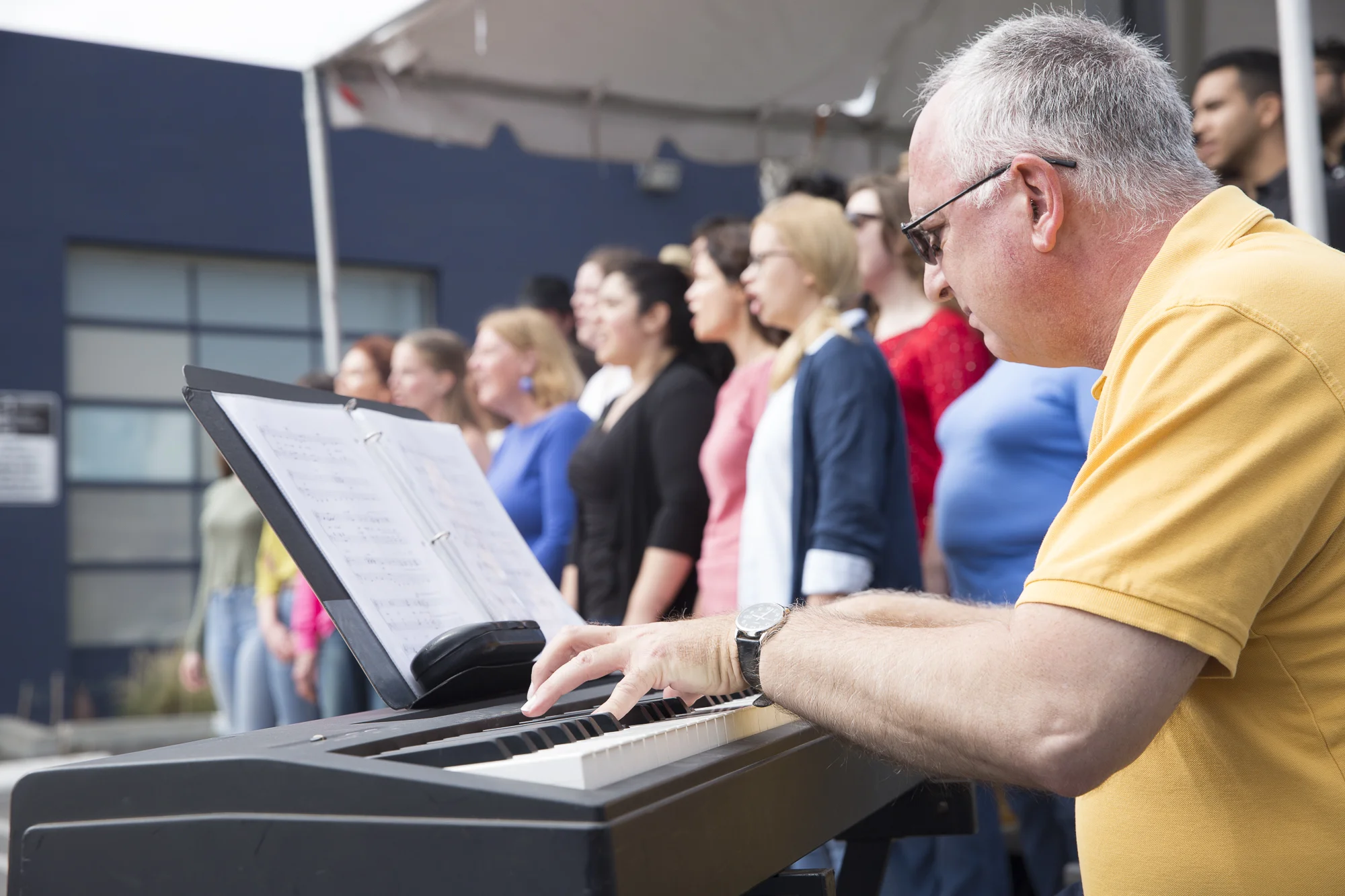 The Santa Monica College Jazz Vocal Ensemble pianist (staff accompanist) Frank Basile (right) plays classic Frank Sinatra songs on the piano during the beginning of the Pico Block Party festivities that took place at the 18th street Arts Center in Santa Monica, California on Saturday May 19, 2018. The Pico Block Party is a celebration of artists and cultures of the Pico neighborhood in Santa Monica with the festivities primarily focusing on youth artists and empowering youth voices. (Matthew Martin/Corsair Photo)