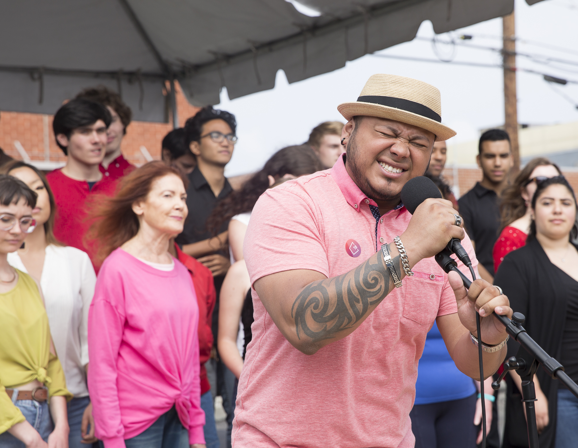  Santa Monica College (SMC) sophomore and member of the SMC Jazz Vocal Ensemble Andy Hernandez performs a classic song by Harry Connick Jr. track during the Pico Block Party festivities that took place at the 18th street Arts Center in Santa Monica, 