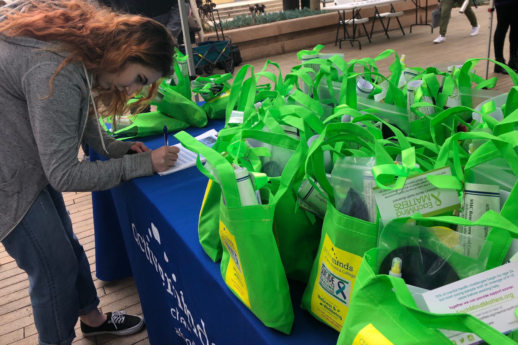  Student Skyler Stark signing up to get a free self-care kit, at Active Minds of SMC's event on Thursday, May 24th, 2018 at Santa Monica College, in Santa Monica, California. (Jennifer Nystrom/Corsair Photo) 