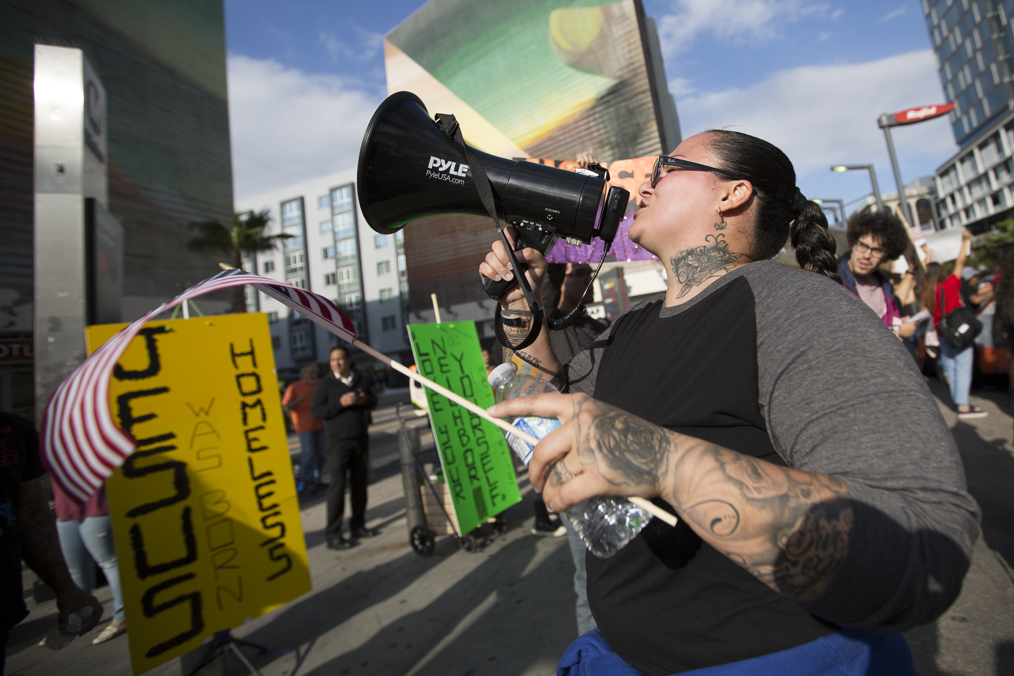  Claudia Perez, the founder and director of the organization L.A. on Cloud 9, rallys the crowd of demonstrators at the corner of Vermont Ave. and Wilshire Blvd. on May 27, 2018 in support of the homeless and the proposed emergency shelter in a nearby