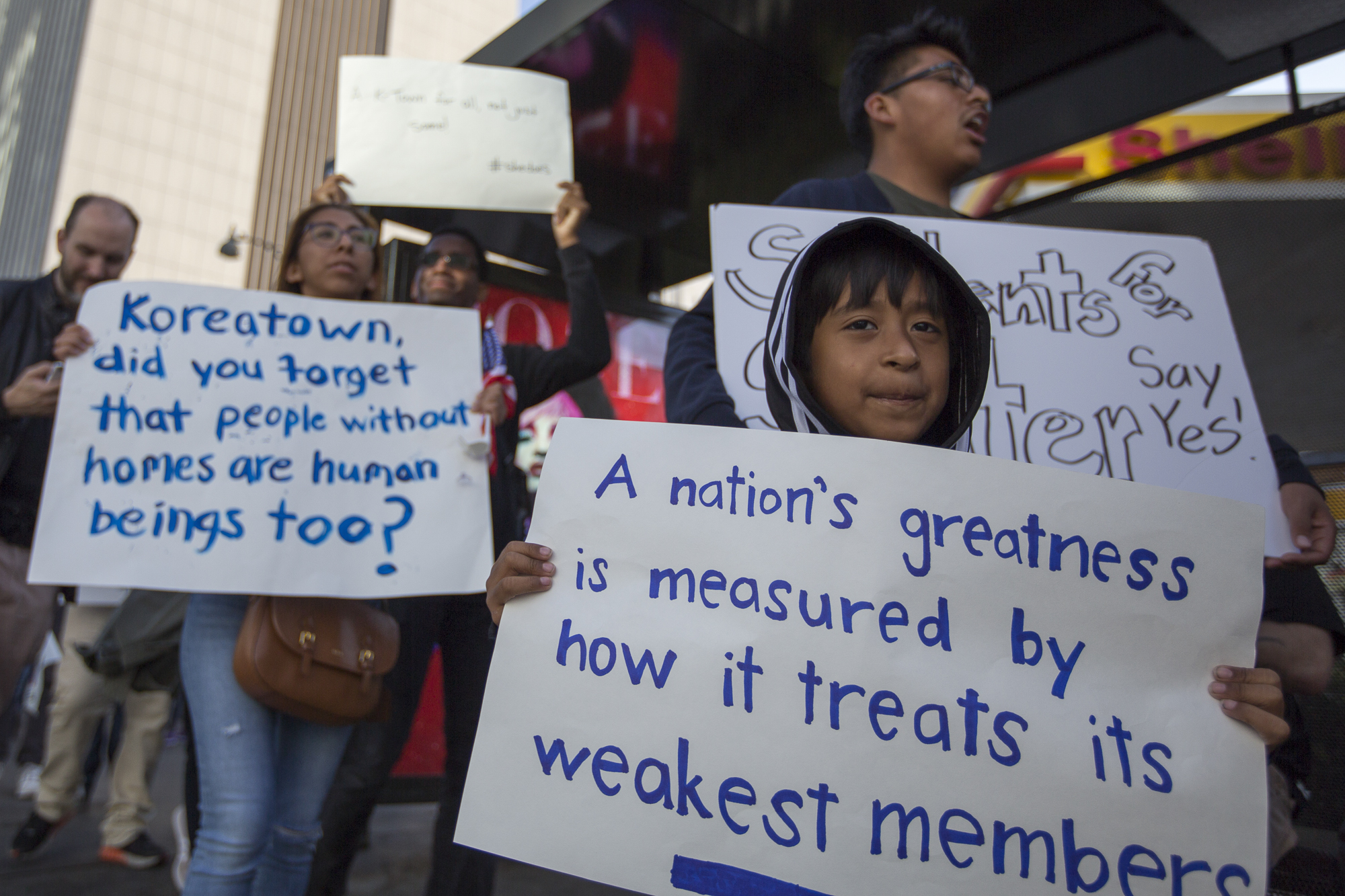  Protesters in support of the proposed emergency temporary shelter for homeless walk along Vermont Ave. to bring about awareness of the issue on May 26, 2018 in the Koreatown area of Los Angeles, California. (Jose Lopez/Corsair Contributor) 