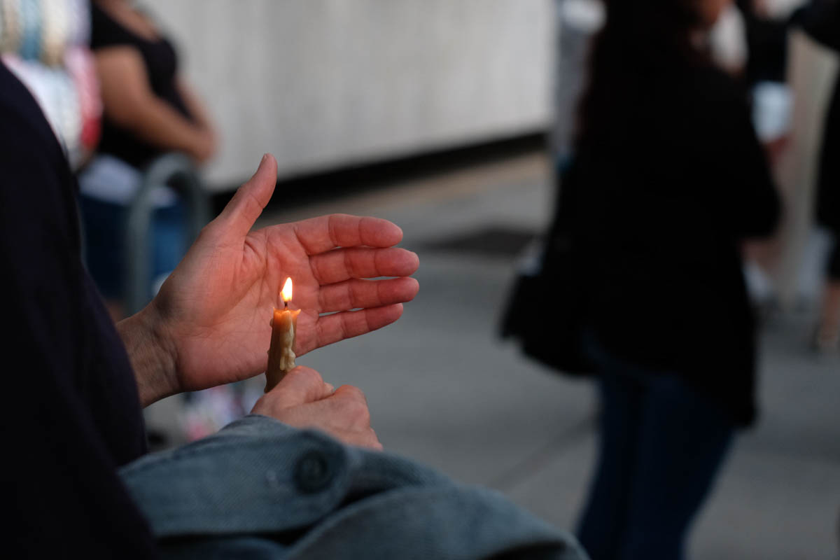 Ceremonial candles are lit as the sun goes down in rememberence of Claudia at the Justice for Claudia Vigil in Los Angeles, California on Saturday June 1, 2018. (Jayrol San Jose/Corsair Contributor)