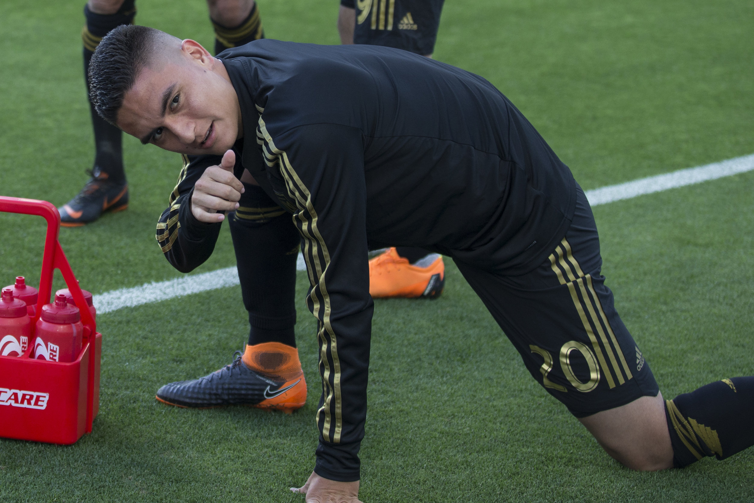  Los Angeles Football Club midfileder Eduard Atuesta (20) says hello to a fan before his match against the Minnesota United Football Club on May 9, 2018 at Banc of California Stadium. LAFC won the match 2-0. (Zane Meyer-Thornton/Corsair Photo) 