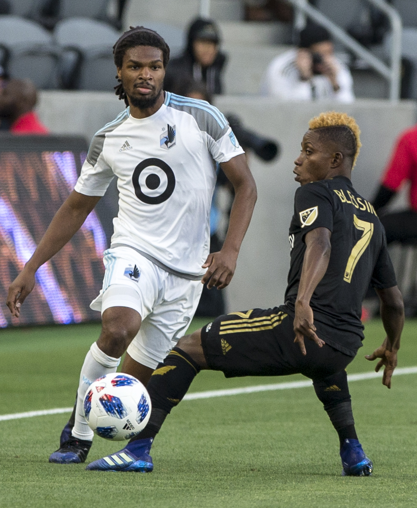  Minnesota United Football Club (MUFC) defender Carter Manley (2, left) manuevers around Los Angeles Football Club (LAFC) forward Latif Blessing (7, right) during their match at Banc of California Stadium on May 9, 2018 where the LAFC won 2-0. (Zane 