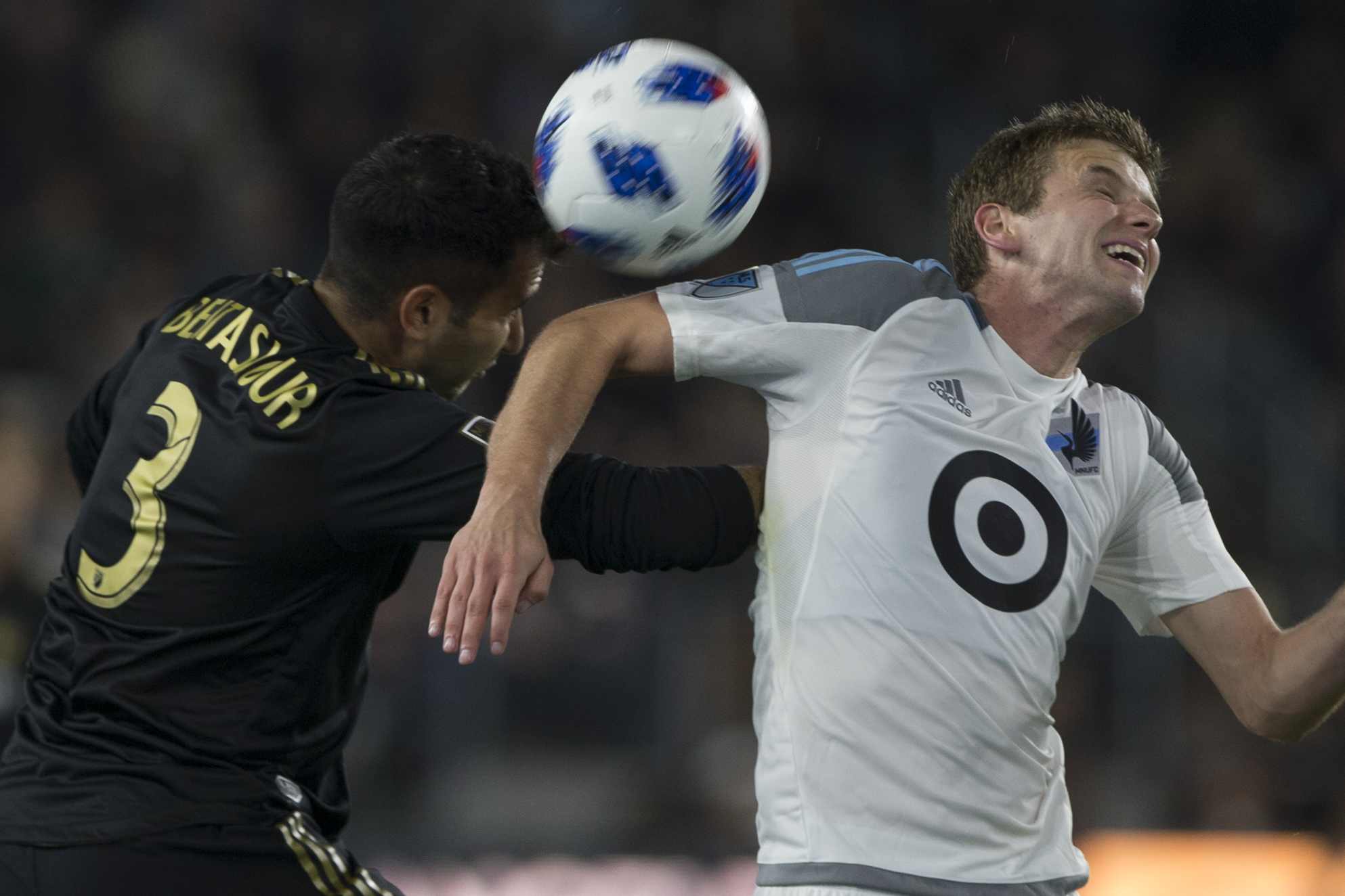  Los Angeles Football Club (LAFC) defender Steven Beitashour (3, left) headers the ball away from Minnesota United Football Club (MUFC) midfielder Collin Martin (right) during their match at Banc of California Stadium on May 9, 2018 where the LAFC wo