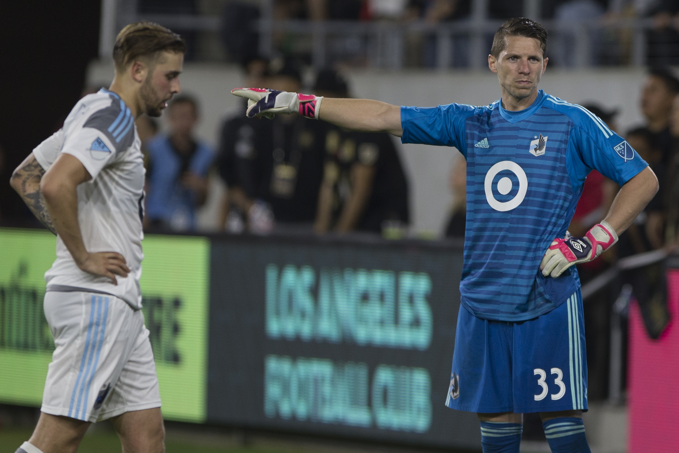  Minnesota United Football Club goalie Booby Shuttleworth (33, right) blames his teammates for a lack of defense during their match against the Los Angeles Football Club  at Banc of California Stadium on May 9, 2018 where the LAFC won 2-0. (Zane Meye