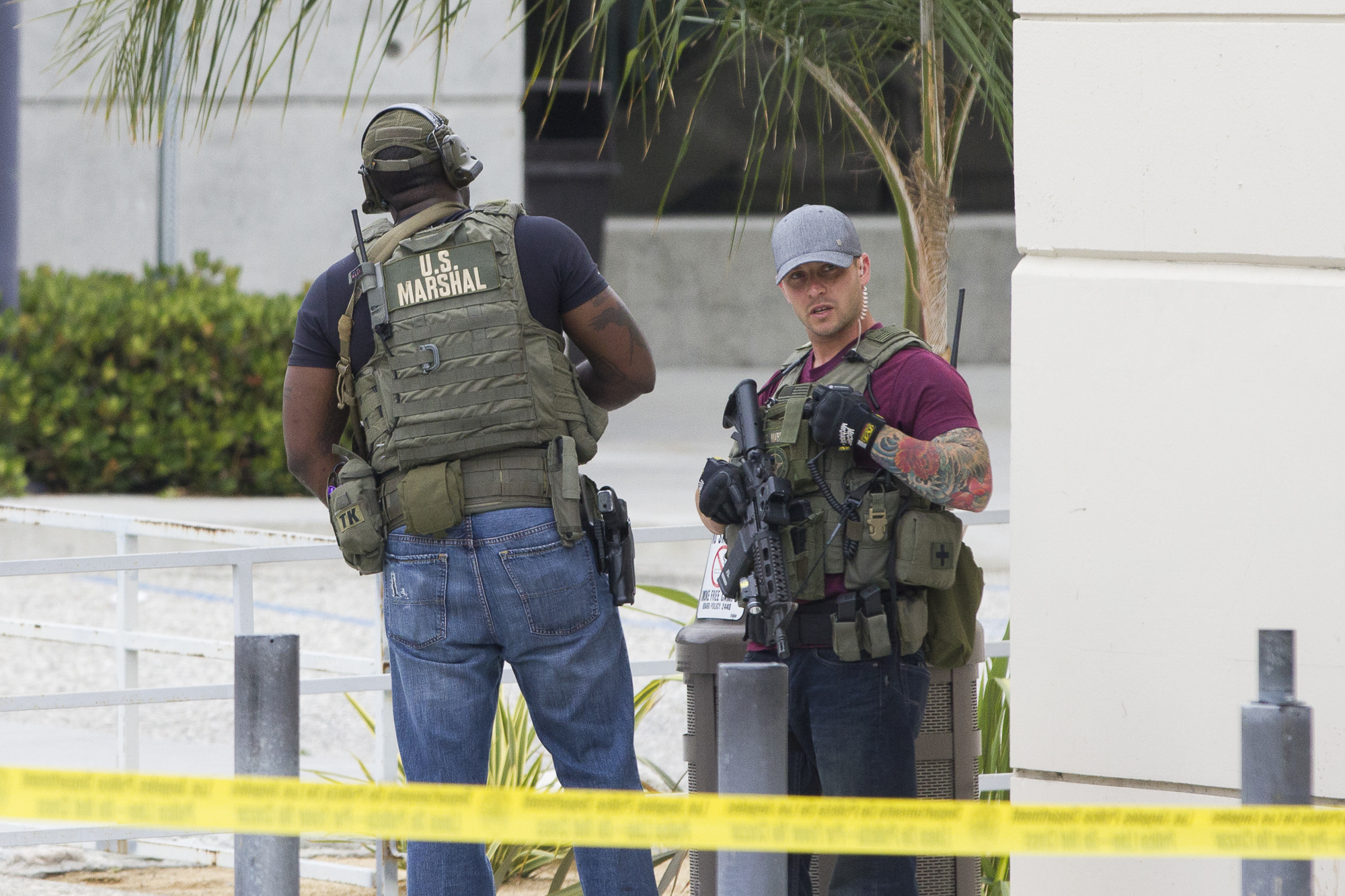  U.S. Marshals search for a possible second shooter on June 7, 2013 in front of the Business Building at Santa Monica College in Santa Monica California. It turned out that the gunman was alone. In total six people, including the shooter, were killed