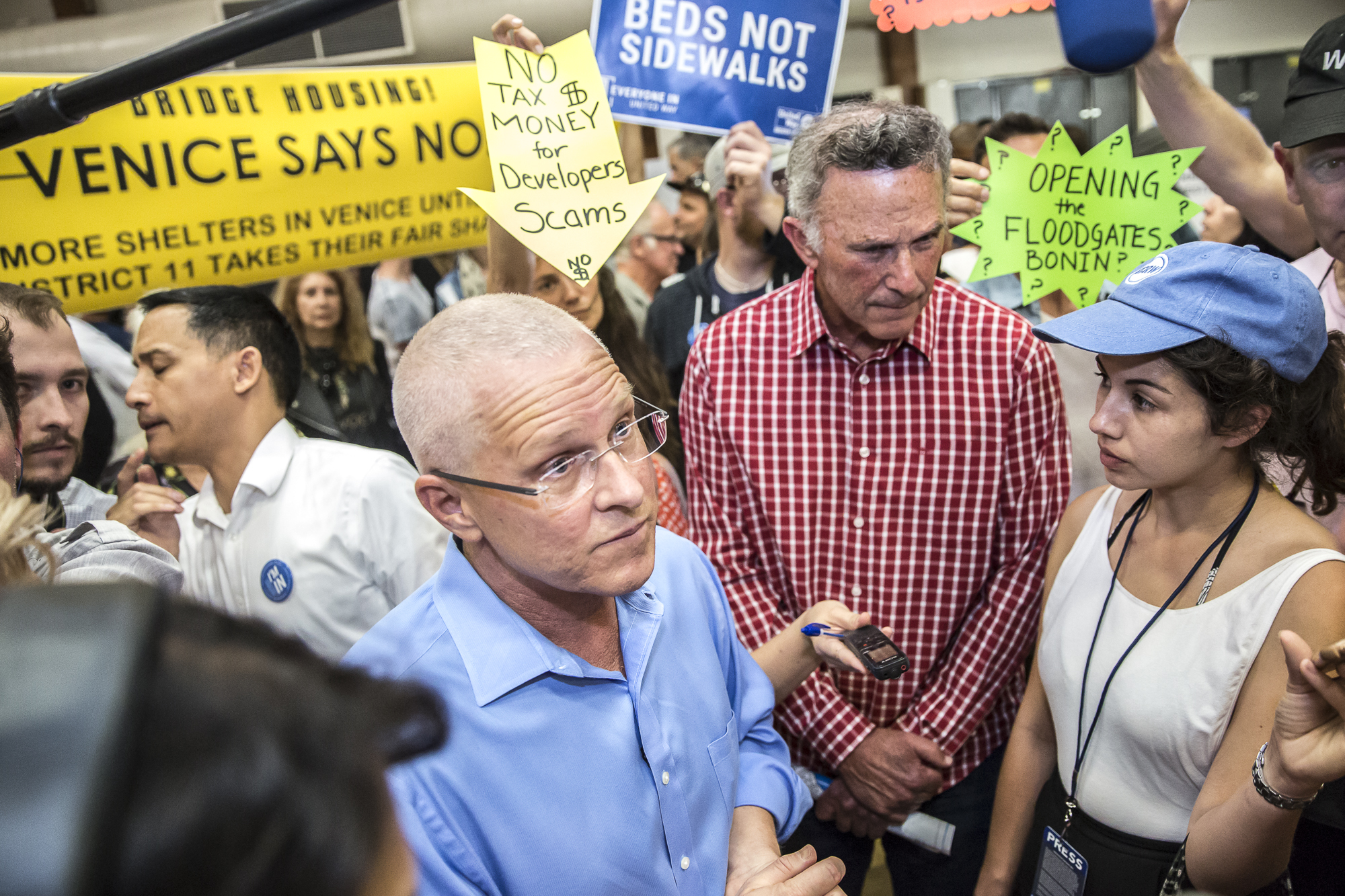  La Councilman Mike Bonin takes questions from local Venice residents regarding the building of a homeless shelter at the former metro bus lot at 100 E. Sunset in Venice that would house 100 people during the town hall that took place at Westminster 