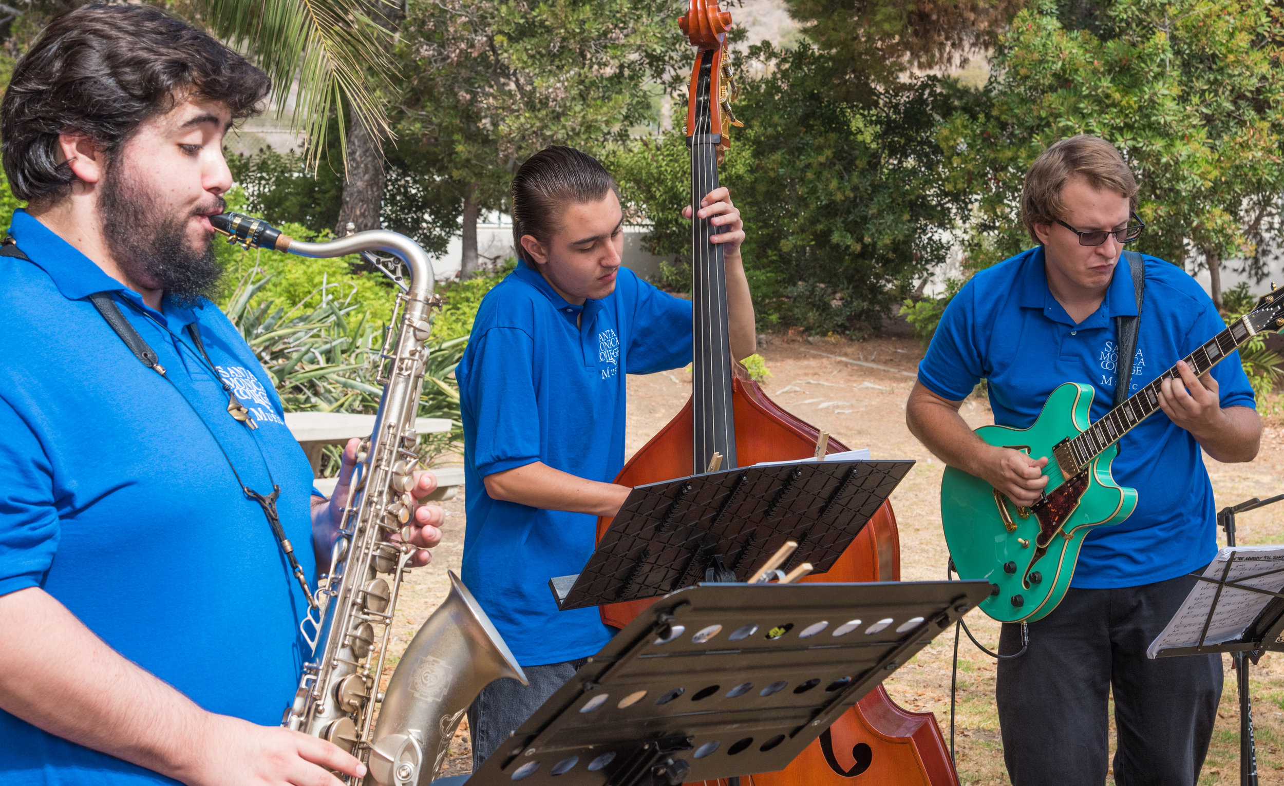  Christian Alva (left), Max Zwarych (center), and Malcom Fisher (right), jazz musicians from Santa Monica College's Applied Music program, perfrom shortly before the official ground breaking ceremony of the Santa Monica College Malibu Campus & Los An