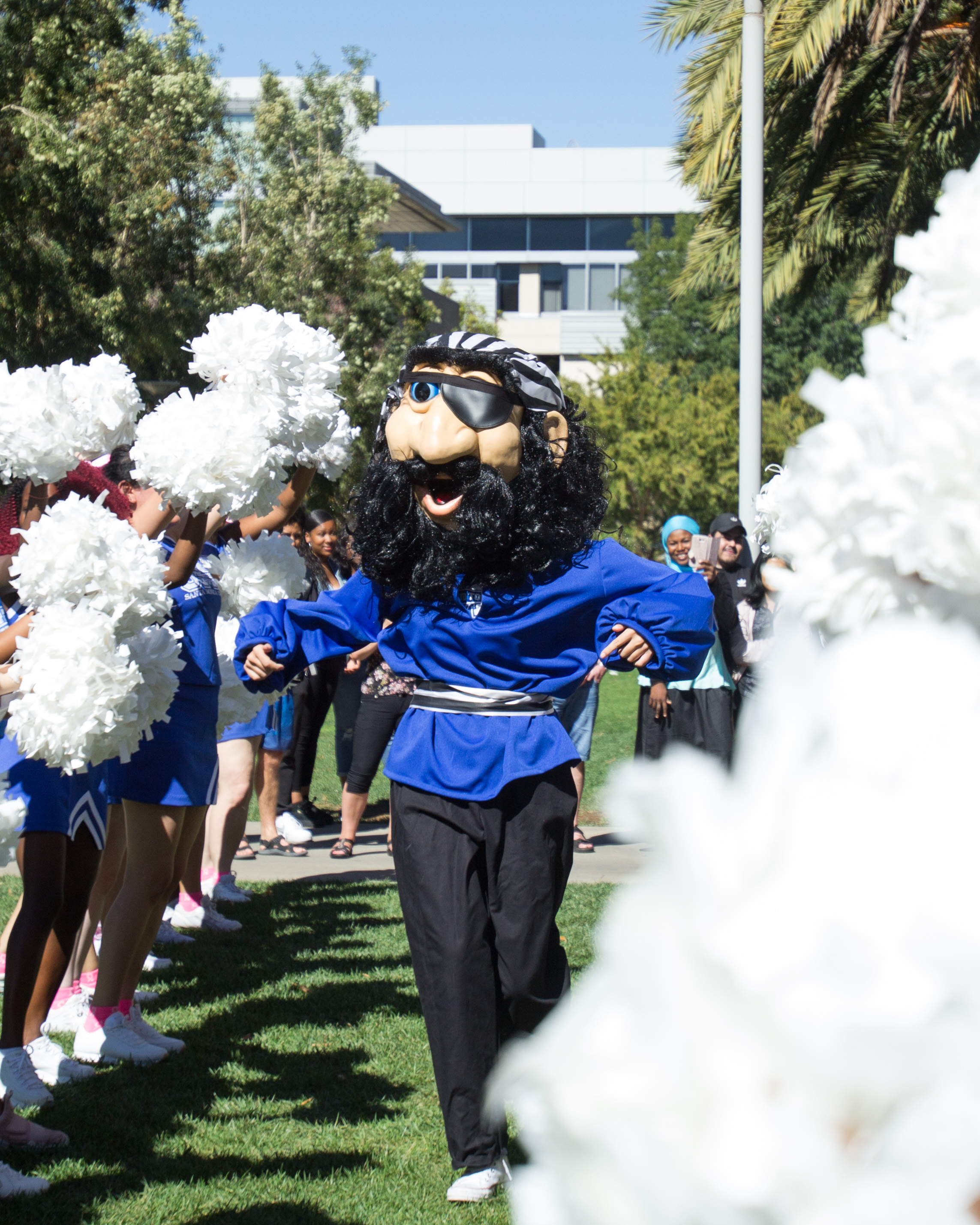  Santa Monica College's Corsair Mascot, Recieves cheers and high fives the Santa Monica Cheer team on the quad area of the Santa Monica Campus in Santa Monica, California on Tuesday Oct. 16, 2018. (Jacob Victorica/ Corsair Photo) 