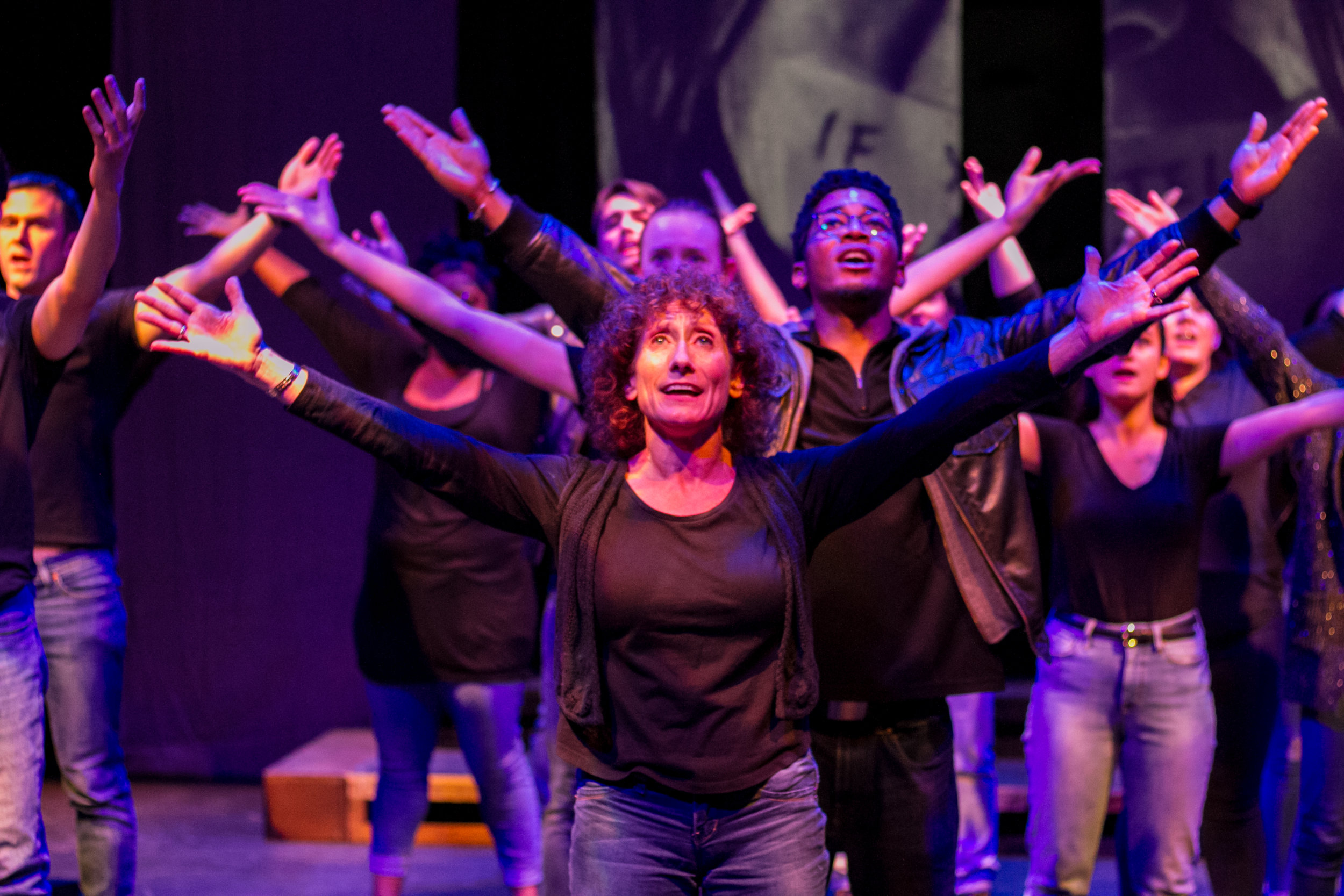 Sara Kaners sings with the cast of Voices of Hope as they shed light and give hope for victims of sexual assault and domestice violence. Dress rehearsal production was in the Santa Monica College's (SMC) Sound Stage Oct. 30, 2018. (Yasser Marte/Corsair Staff)