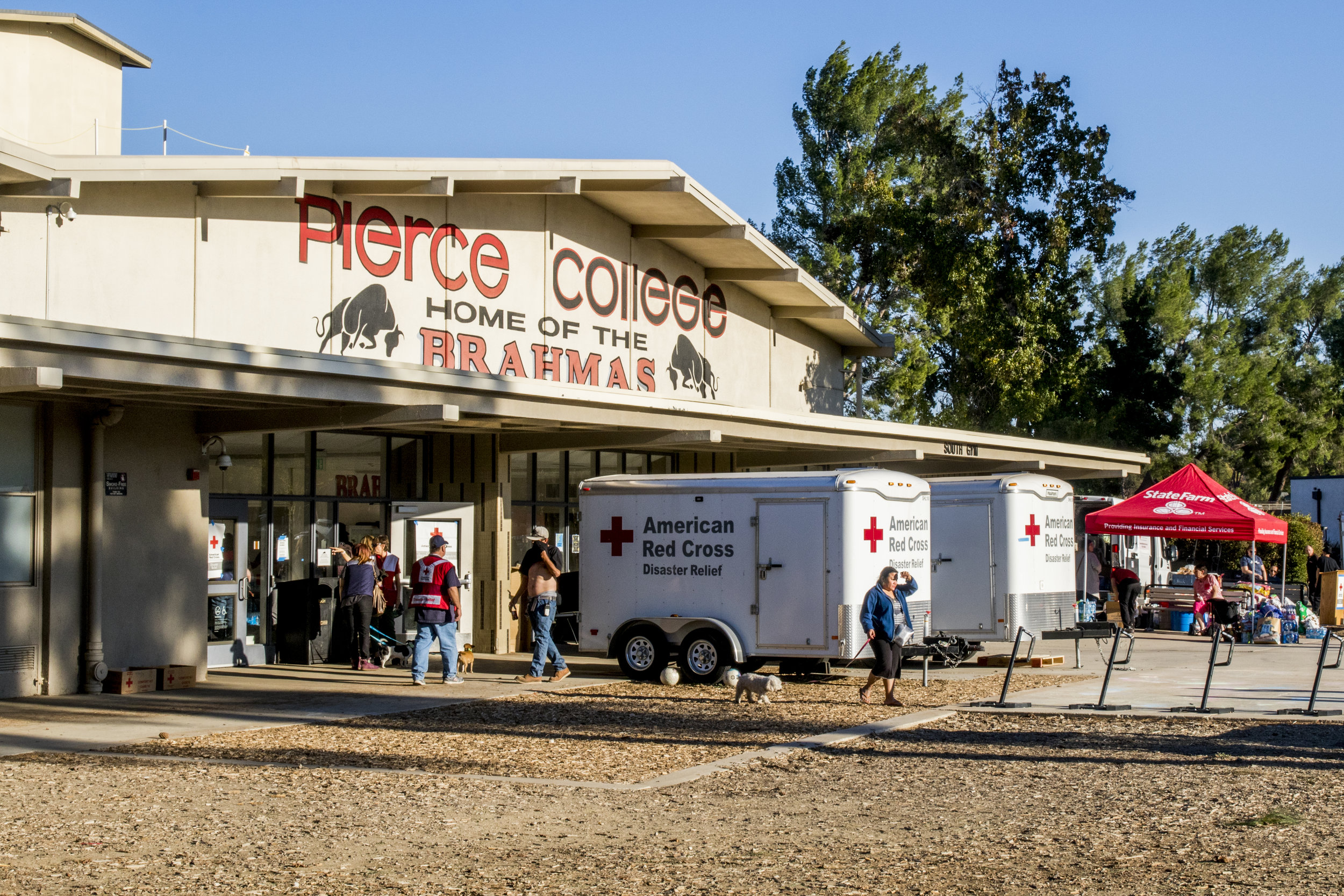 The American Red Cross and State Farm Insurance have set up outside of Pierce Colleges South Gym in Woodland Hills, California on November 9, 2018. The organizations are at the college to provide supplies and support to any person or animal seeking refuge from the Woolsey Fire. (Zane Meyer-Thornton/Corsair Photo)