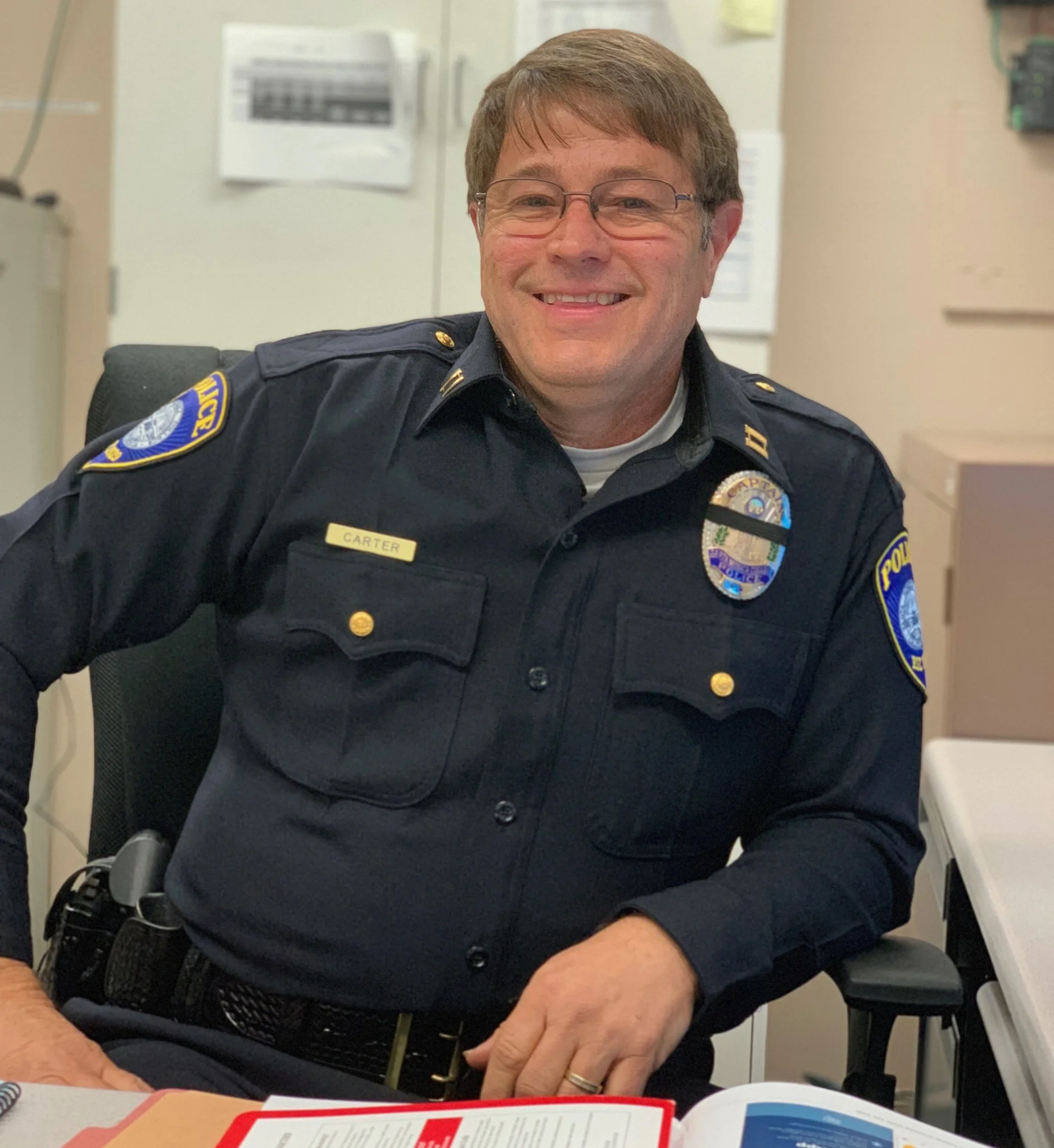 Newly appointed Santa Monica College Police Department Captain Vincent Carter sits in his new office on Pearl Street, across from SMC Main Campus on November 19, 2018 (Brenna Spalding/ Corsair Staff)