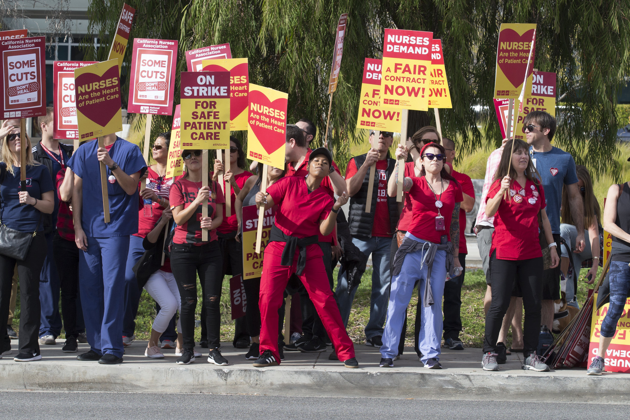  Members of the California Nurses Association protest at a Nurses Strike outside of Providence Saint Johns Health Center in Santa Monica, California on November 27, 2018. The nurses were striking over the unfair treatment they are receiving from Prov