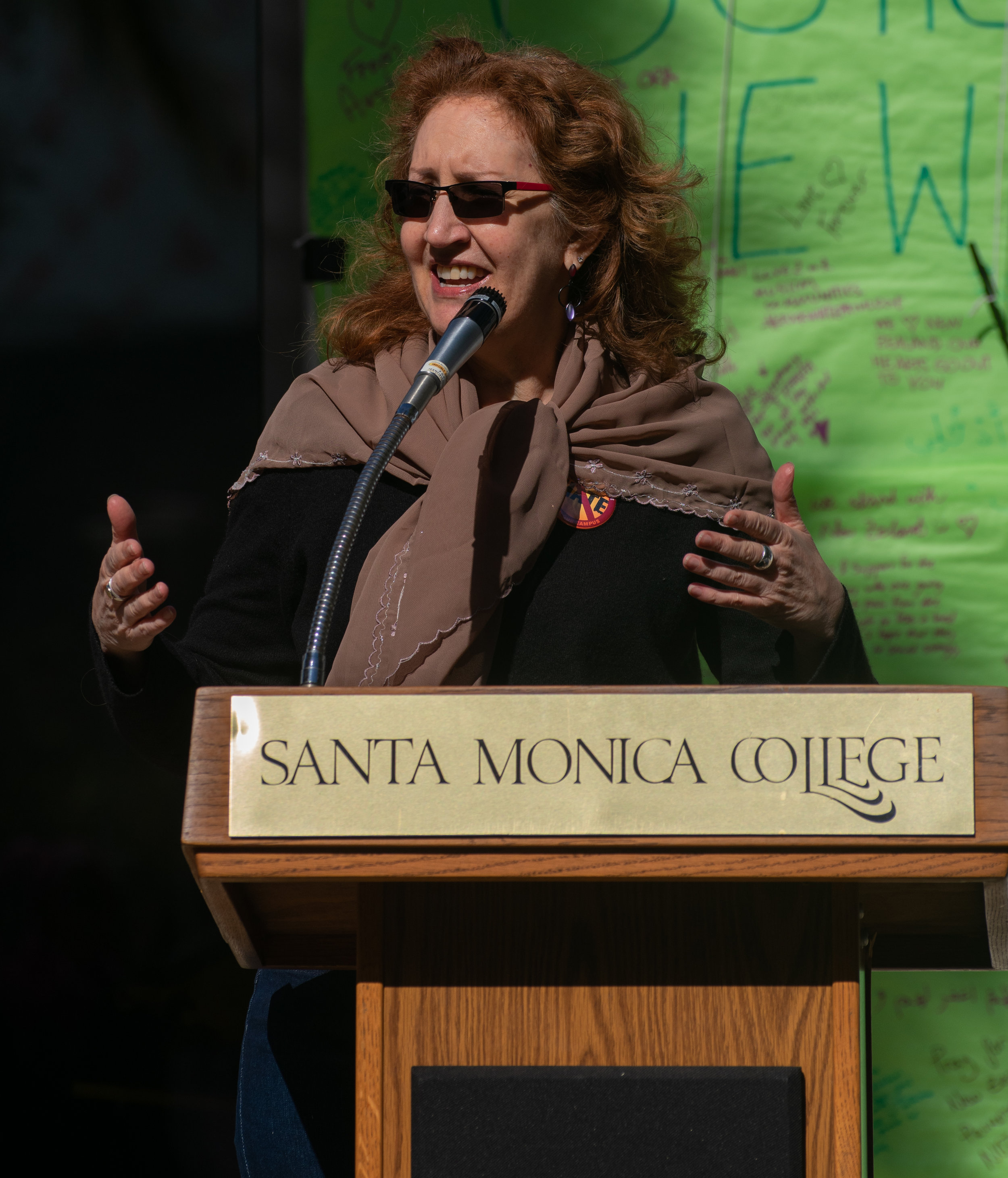  Lisa Patriquin from the Guidbord Center for Interfaith Dialogue explaining the benefits of attending service of another religion at  vigil for the victims of the Christchurch shootings on Wednesday March 20th 2019 at Santa Monica College (SMC), Sant