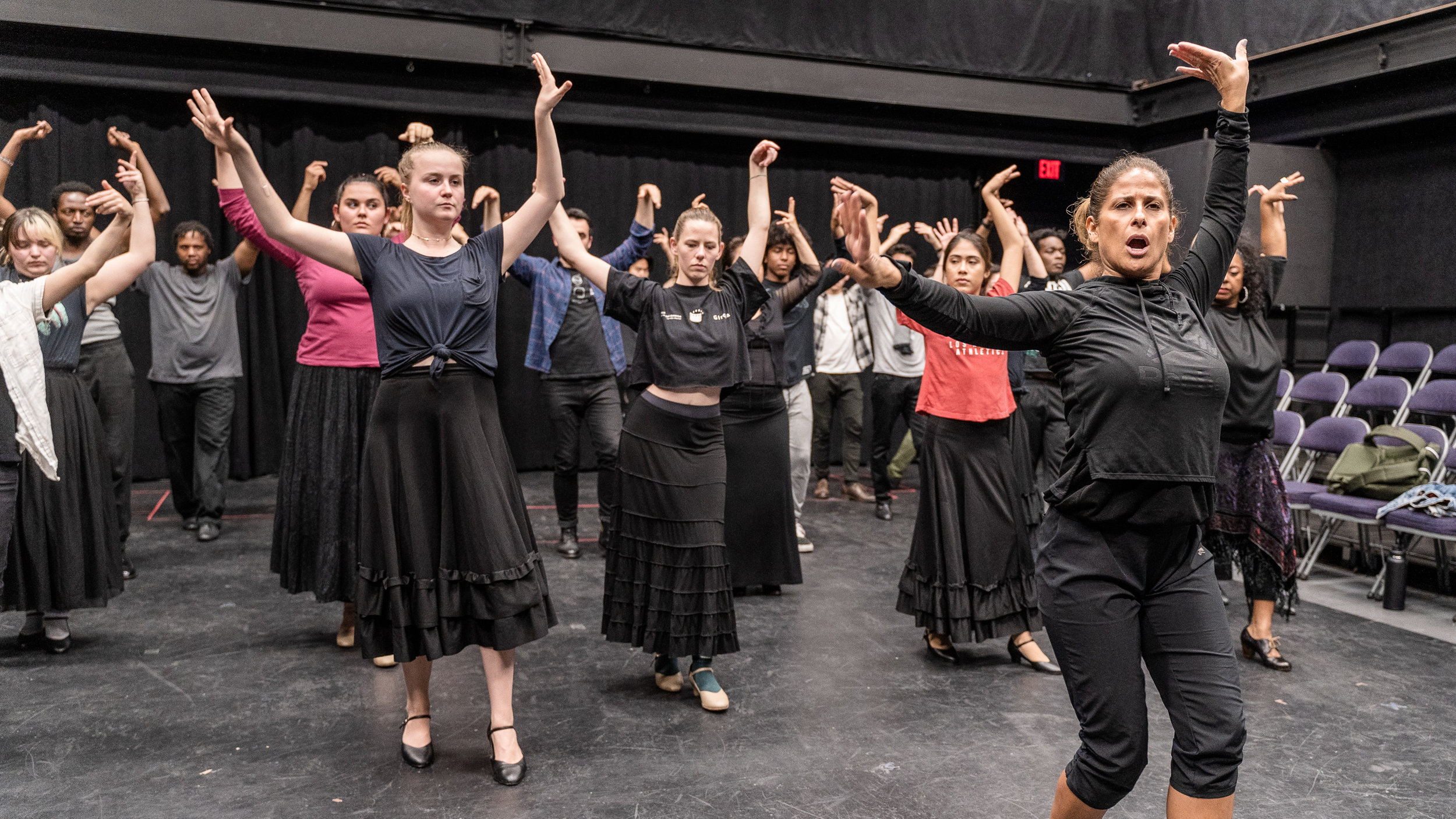  Flamenco Macbeth co-choreographer and SMC Theatre & Dance faculty member Cihtli Ocampo (front-right, in all black) teaches flamenco choreography to the cast of SMC’s upcoming production of Flamenco Macbeth at the SMC Studio Stage, the space where Fl