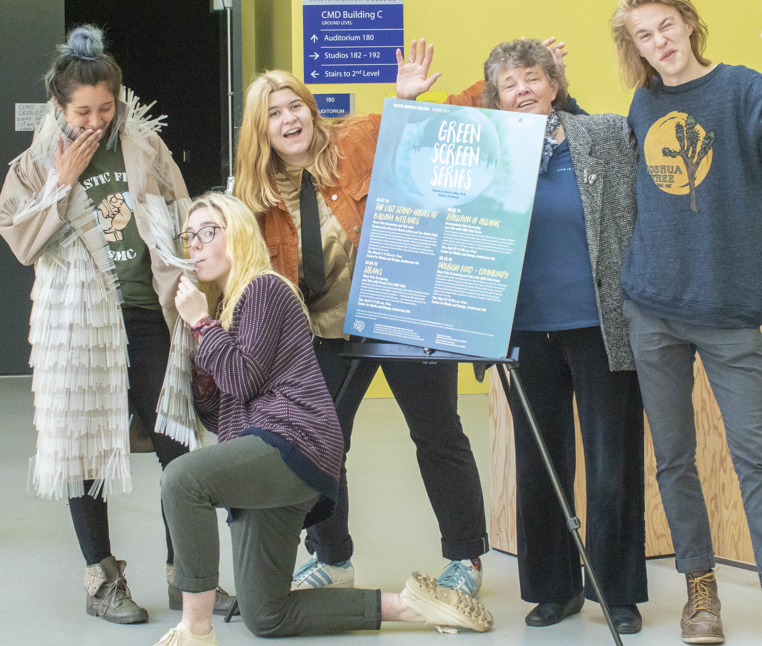 Santa Monica College (SMC) students and Sustainability Club members, Brooke Harrington (left), Carla Claure, Carly Havenick, Liam Hay (far right), with Adjunct Professor Sheila Laffey (second to right), pose out front of the auditorium of the Center for Media Design where the short film Straws screened just before, on Thursday, April 4. Santa Monica, California, 2019. (Victor Noerdlinger/Corsair)
