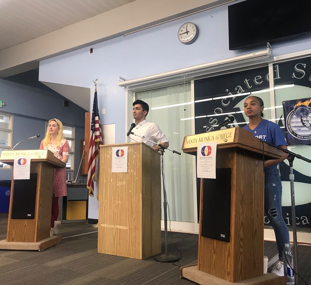  Student Brooke Harrington, debate moderator and organizer Amirreza Toloei, and student Gabrielle Montgomery at the Left, Right, and Center debate at the Cayton Center on April 16, 2019. (Anna Duares/ The Corsair)  