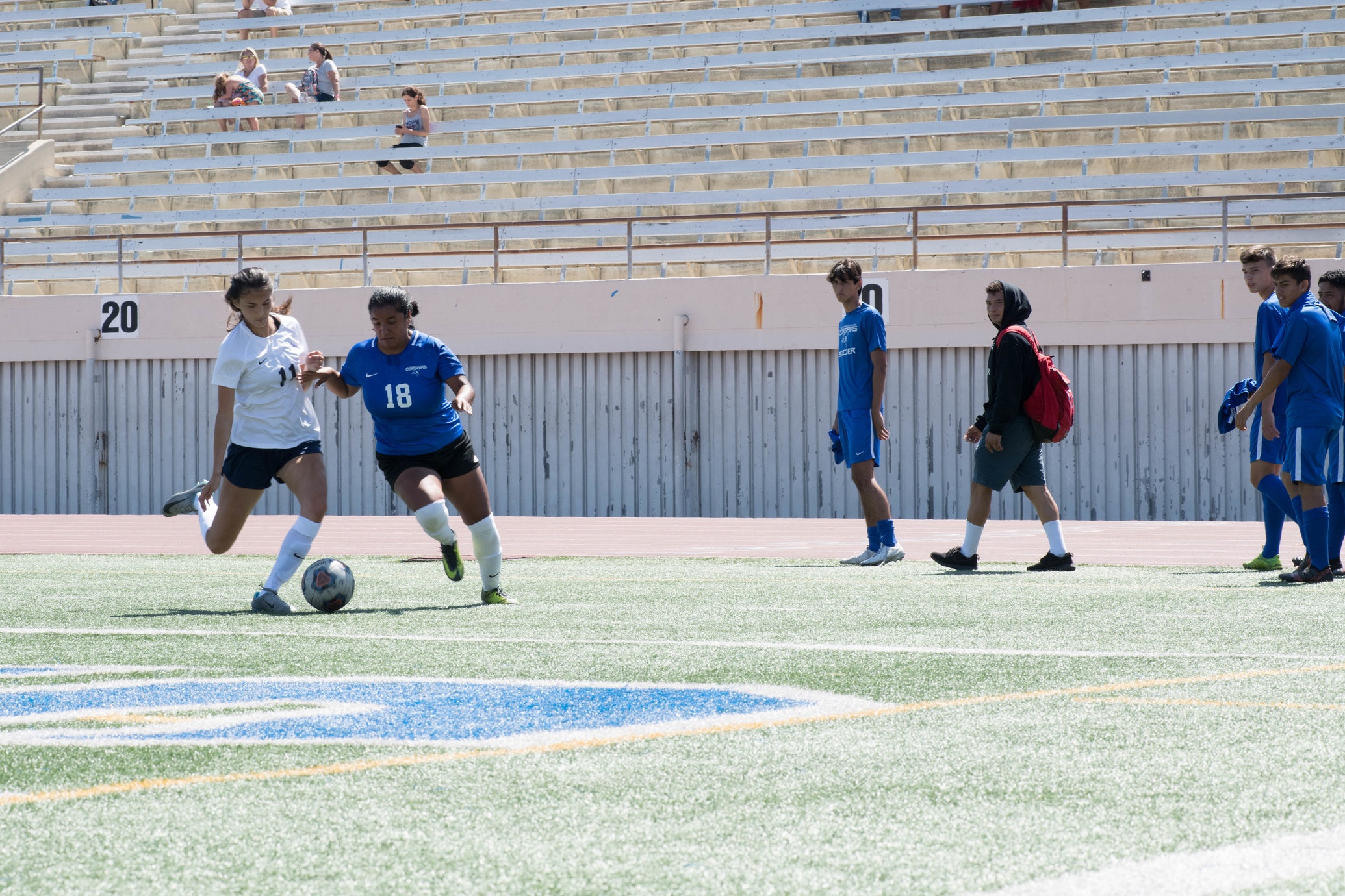  Cindy Castro #18 trying to stave off an El Camino player from getting the ball.(Photo By Kevin Tidmore/Caption By Deshawn Pouper/The Corsair) 