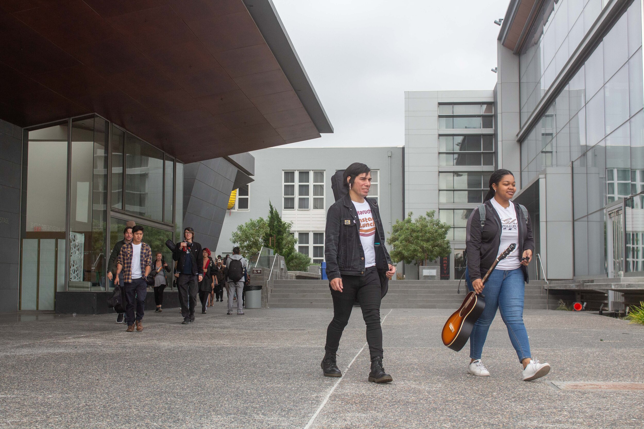  Students exit Santa Monica College's Performing Arts Center with their instruments during the Great ShakeOut 2019, a statewide earthquake preparedness drill, on October 17, 2019, in Santa Monica, Calif. 