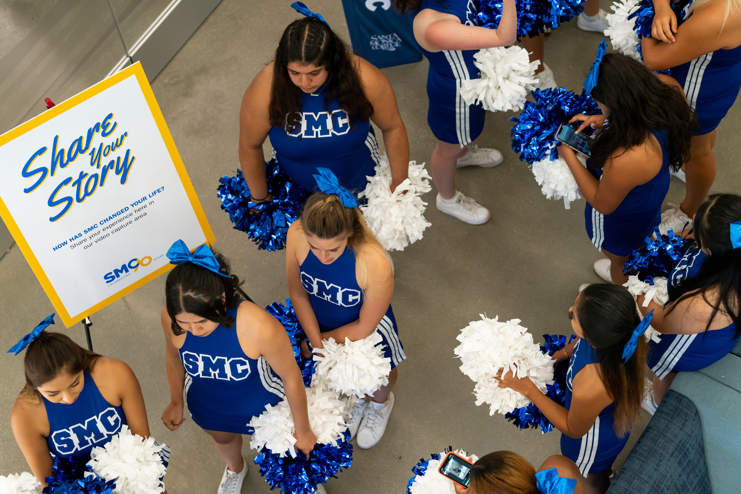  The Santa Monica College Cheer Club gets ready to perform at the the ribbon cutting ceremony  for the new Student Services Center and 90th Anniversary Celebration at the Santa Monica College main campus on October 22, 2019.  (Suzanne Steiner/The Cor