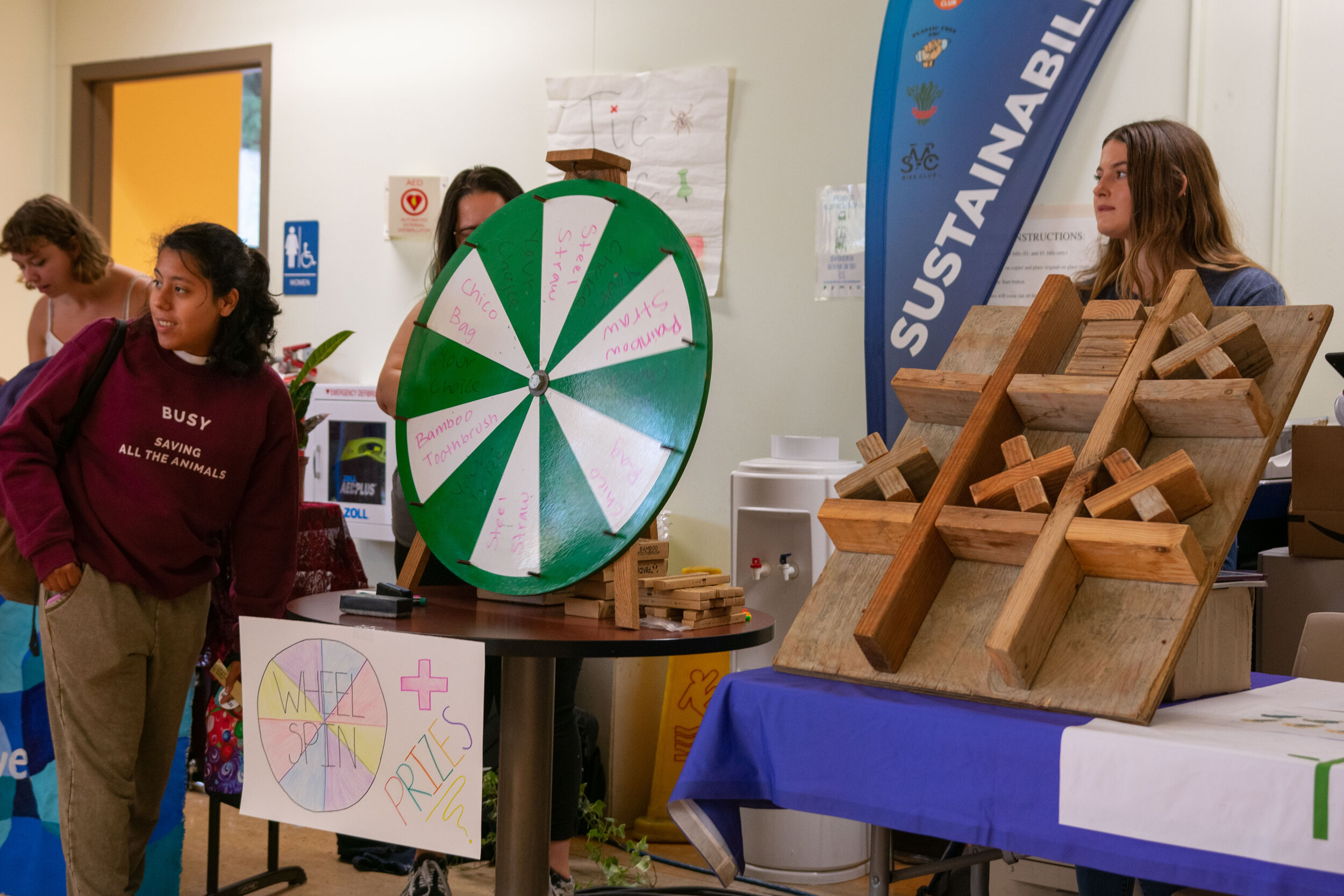  After completing a tour of the tables at the Sustainability Week kickoff event, students can spin a wheel to win a prize. (Conner Savage/The Corsair) 