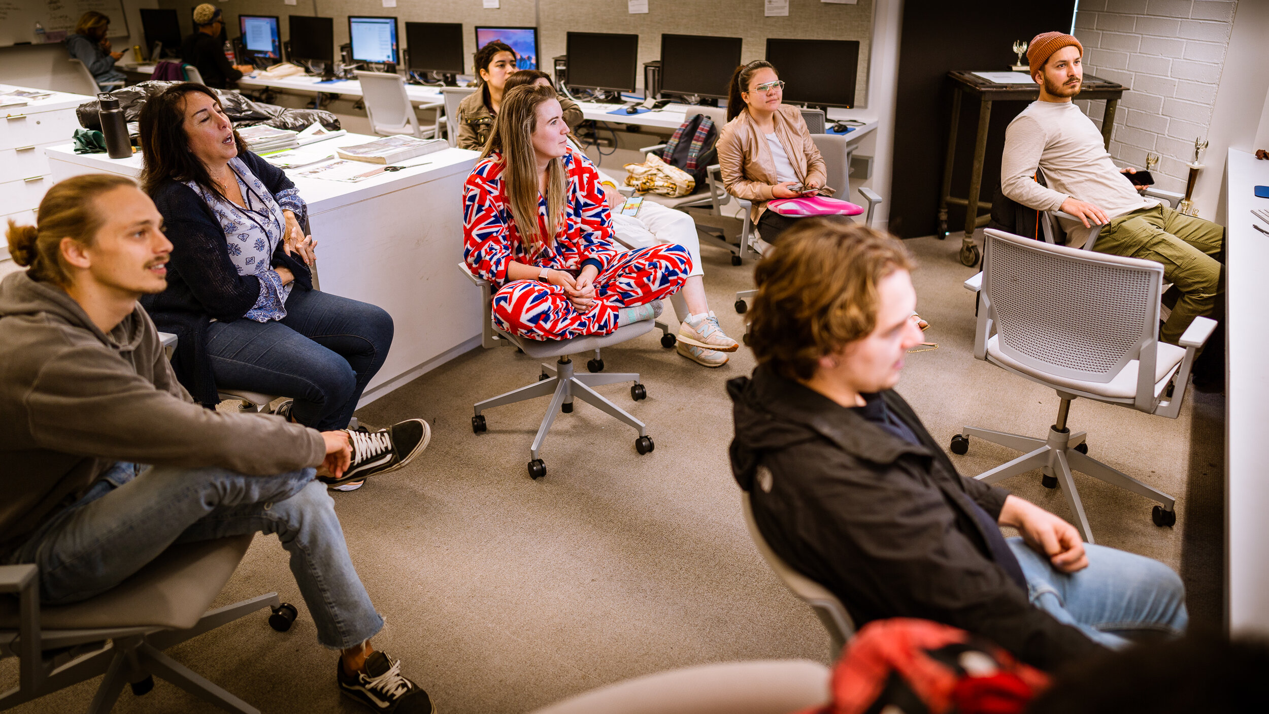  Staff members show up on Tuesday, Mar. 10, 2020 to take part in read-throughs led by opinion editor Evan Minniti.  (Glenn Zucman | The Corsair)  