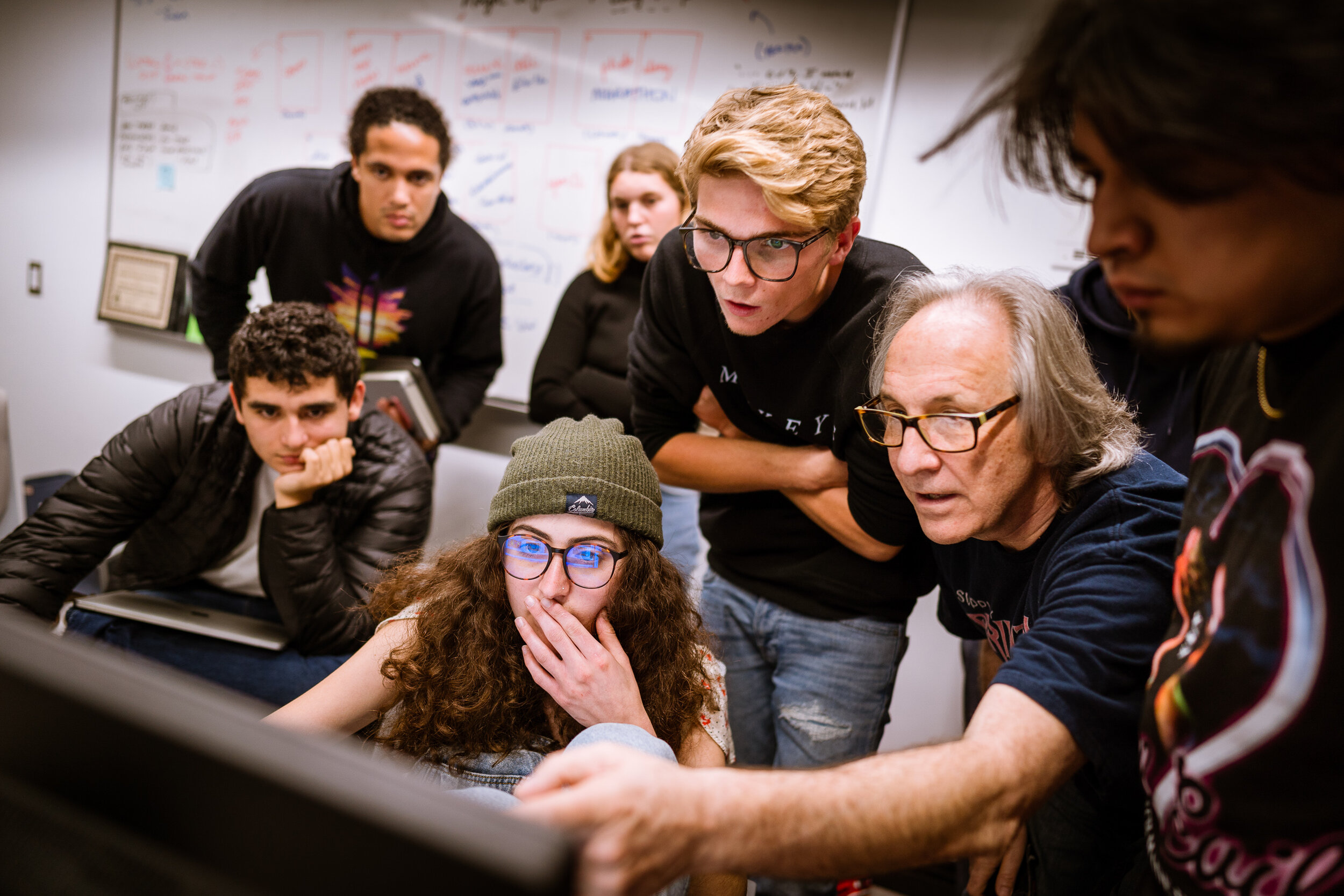  The Corsair Newsroom then: back row, L to R: Maxim Elramsisy, photographer, Dana Binfet, Social Media Editor, Jack Hughes, Managing Editor, Marco Pallotti, Photo Editor, Fernando Duran, Multimedia Editor, front row: Kiran Baez, writer/photographer, 