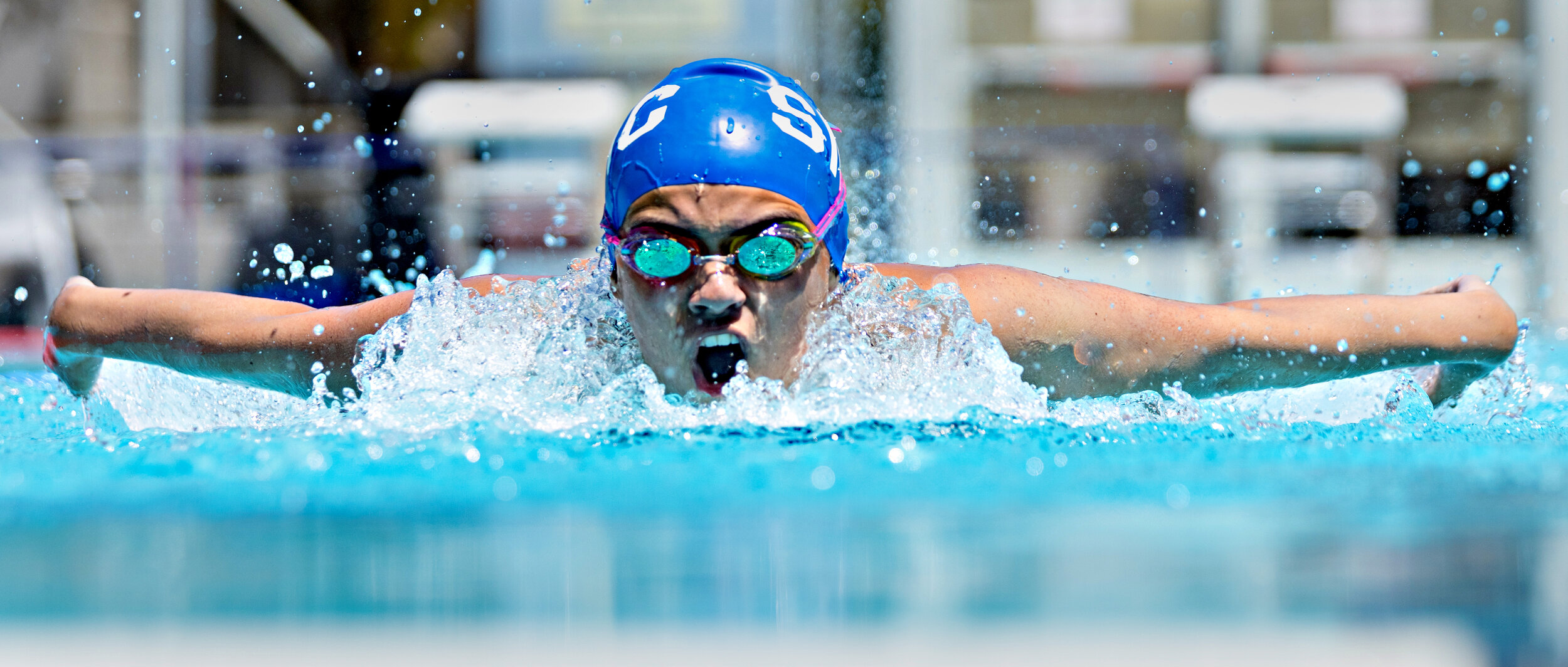  Giuliana Catro competes in the 100 yard butterfly at the Santa Monica Swim Center in Santa Monica, California on Friday, April 17, 2021.  It was the SMC's first swim meet since the 2020 season was cancelled due to the COVID-19 pandemic. 
