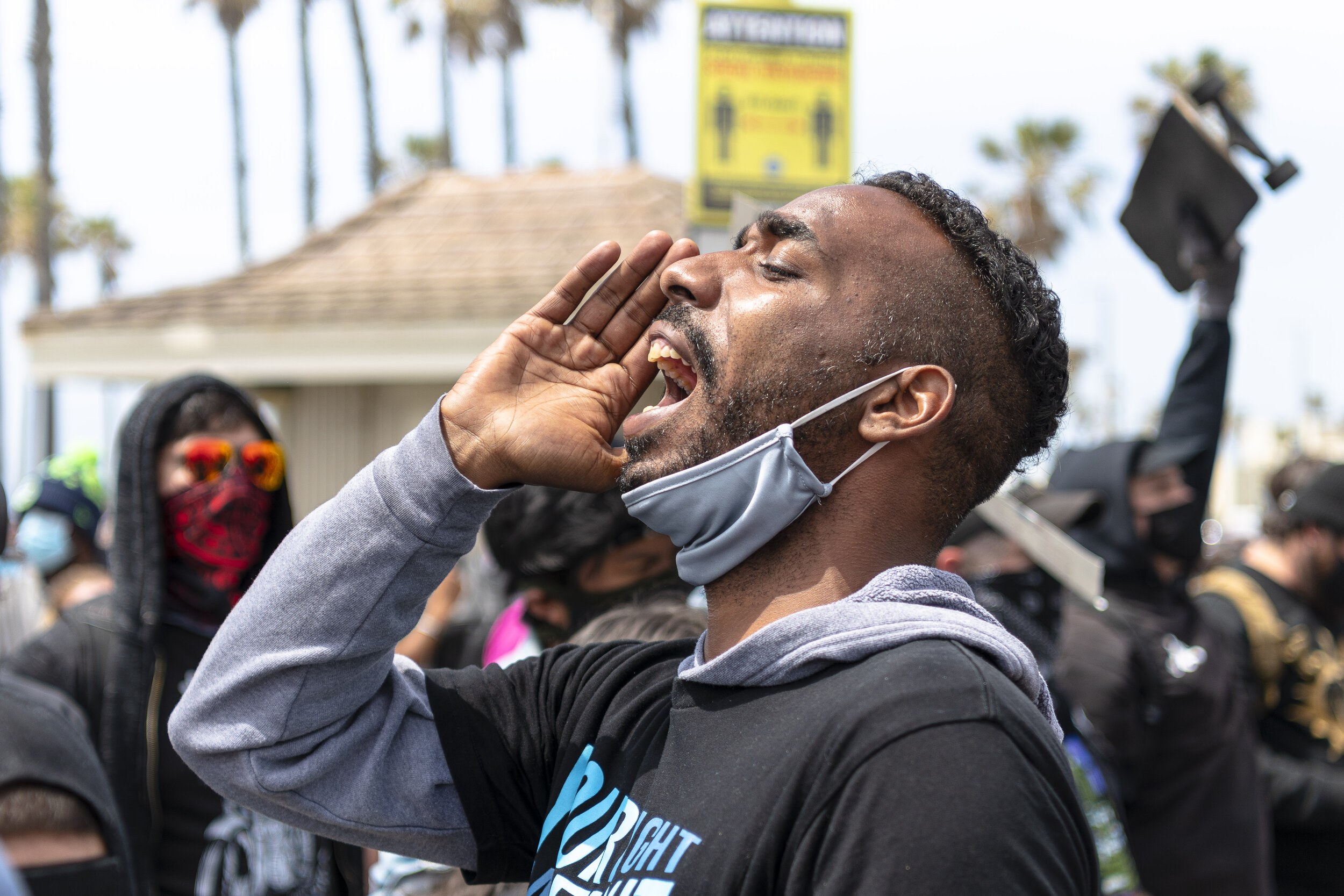  Black Lives Matter (BLM) protesters gather to counter-protest White Lives Matter (WLM) members in Huntington Beach, Calif. on March 11, 2021. After reports of WLM flyers were found in Huntington Beach and other surrounding areas supporting today's e