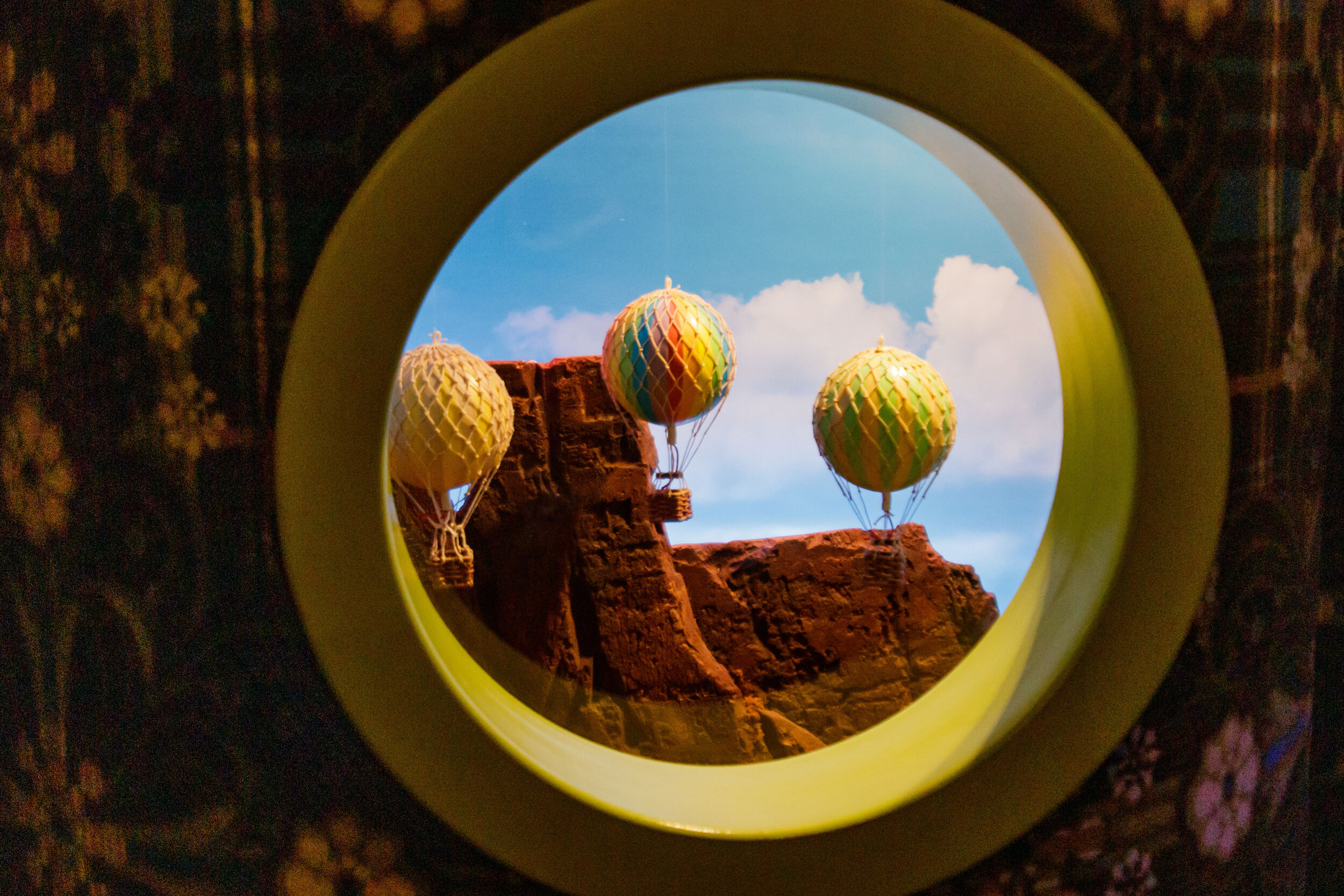   A diorama behind a porthole in a room at the Madcap Motel, in downtown Los Angeles, Calif., on Saturday, May 8, 2021. Marco Pallotti | The Corsair  