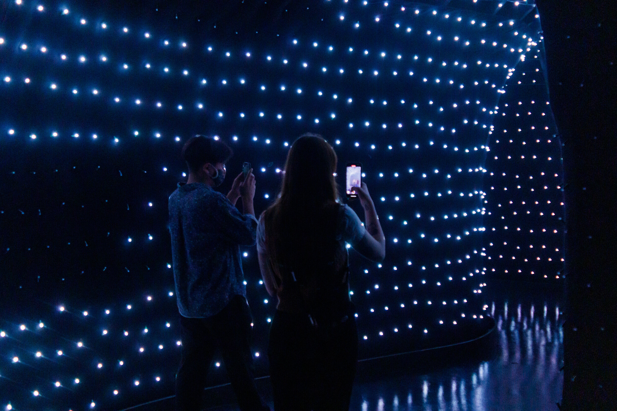   Visitors enter the immersive part of the experience through a tunnel lit by thousands of tiny lights, at the Madcap Motel, in downtown Los Angeles, Calif., on Saturday, May 8, 2021. Marco Pallotti | The Corsair  