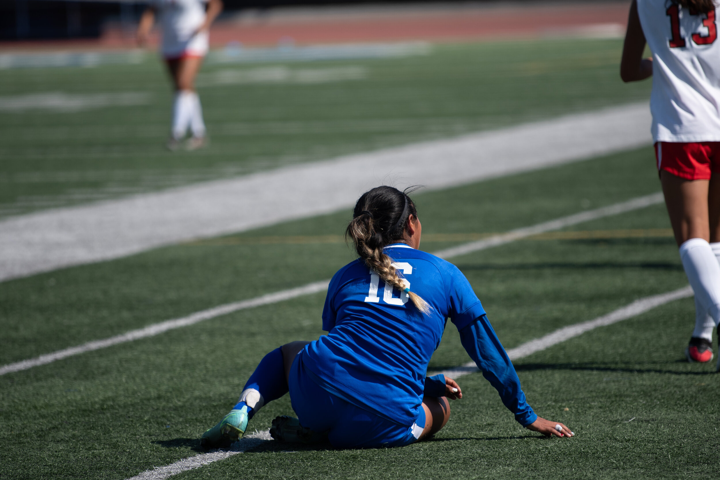  Diana Gaspar of the Santa Monica College Corsairs recovers from a harsh hit on the Santa Monica College Corsair Field in Santa Monica, Calif. on September 10, 2021. The match against Chaffey is their third game of the year, and their second proper g