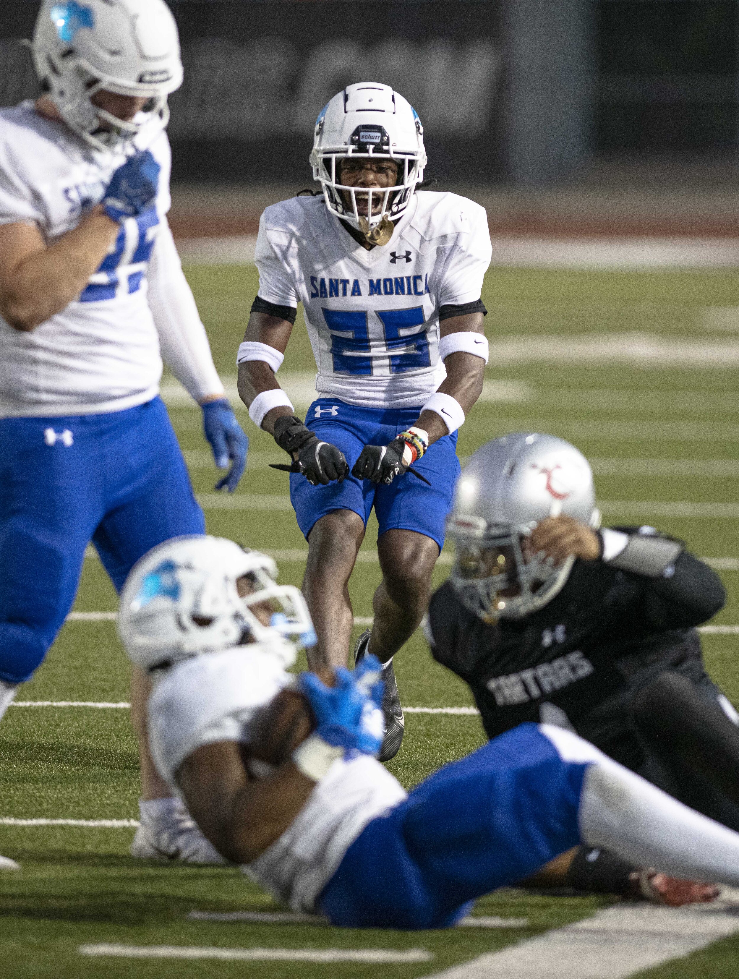  Santa Monica College defensive-back Nevan Lambert (25), for the, celebrates a crucial interception from another team-mate on September 11, 2021 at Compton College  in Compton, Calif. (Jon Putman | The Corsair) 