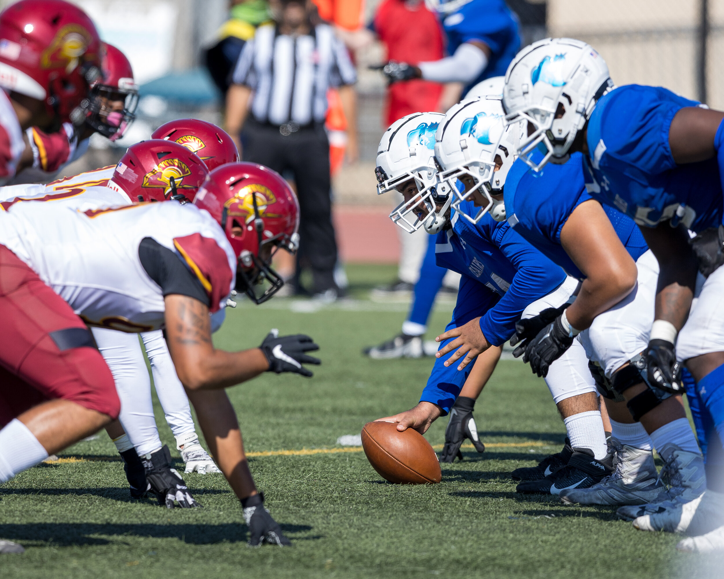  Teams line up before a play. (Maxim Elramsisy | The Corsair) 