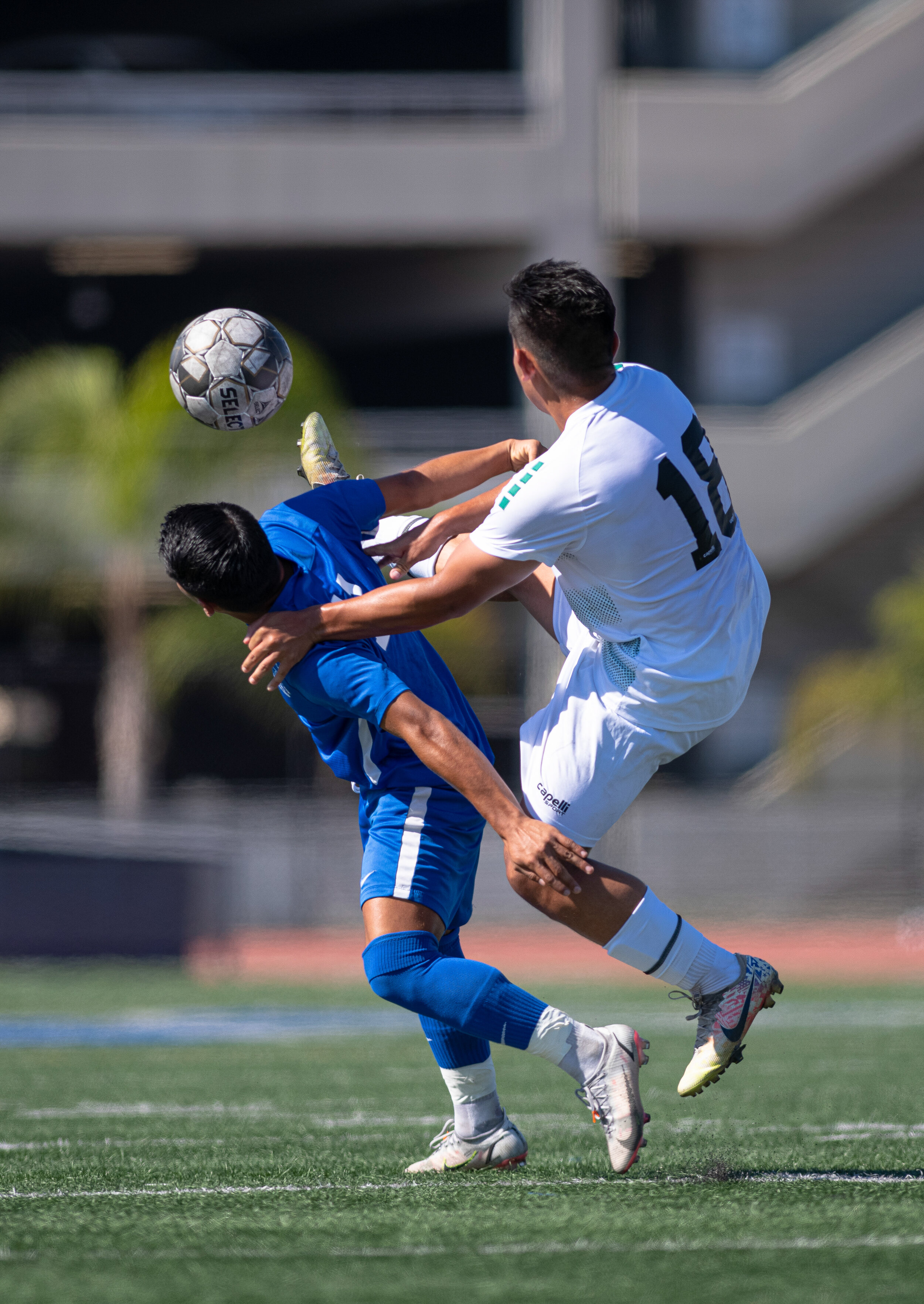  SMC Freshman Denilson Garcia (11), holds off a defender as they fight for the ball on September 21, 2021 at Santa Monica College in Santa Monica, Calif. (Jon Putman | The Corsair) 