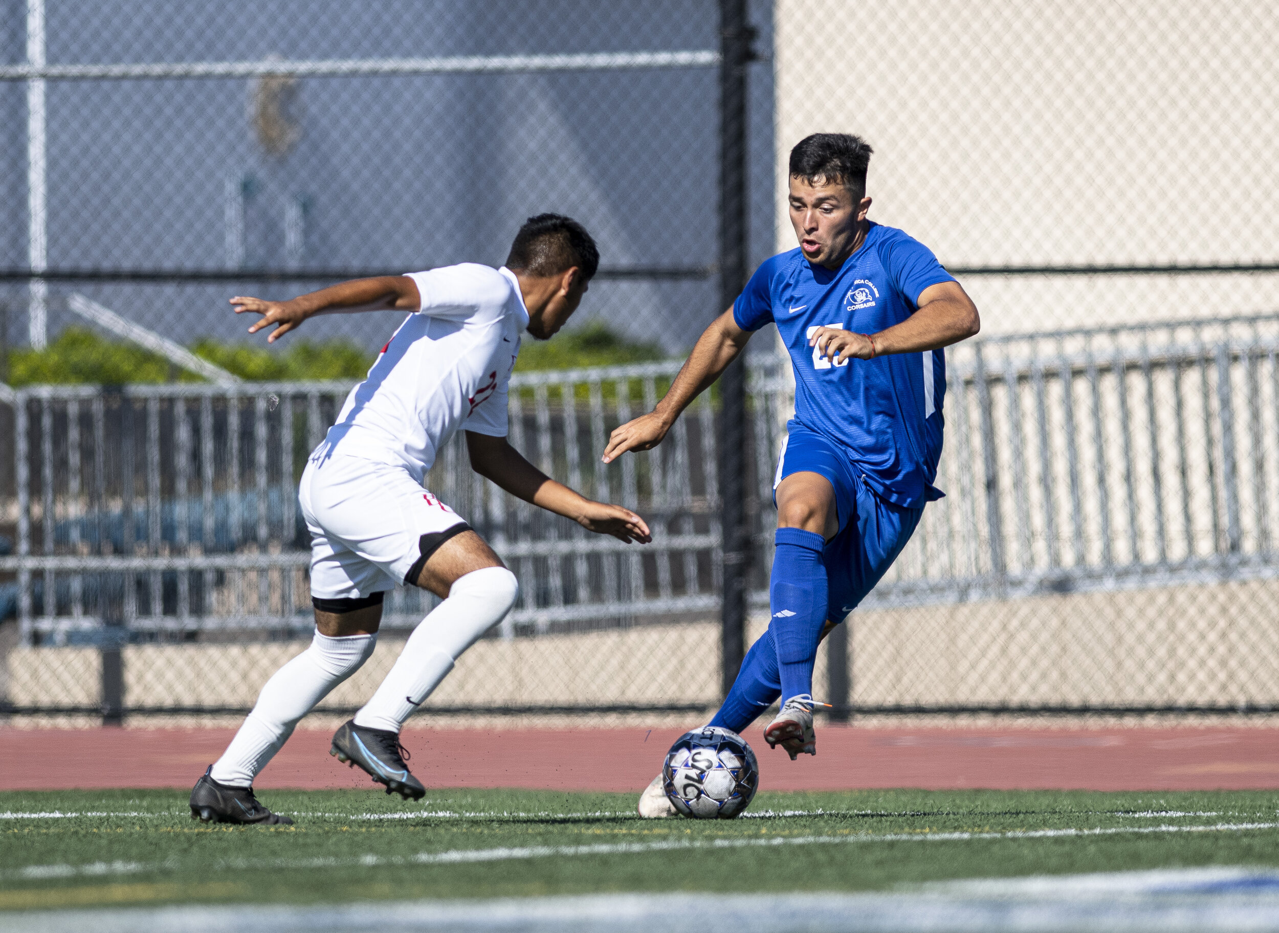  Santa Monica College Corsairs freshman Luis Heredia (25), dribbles the ball down the field past the Bakersfield defender towards the goal just before half time. (Jon Putman | The Corsair) 