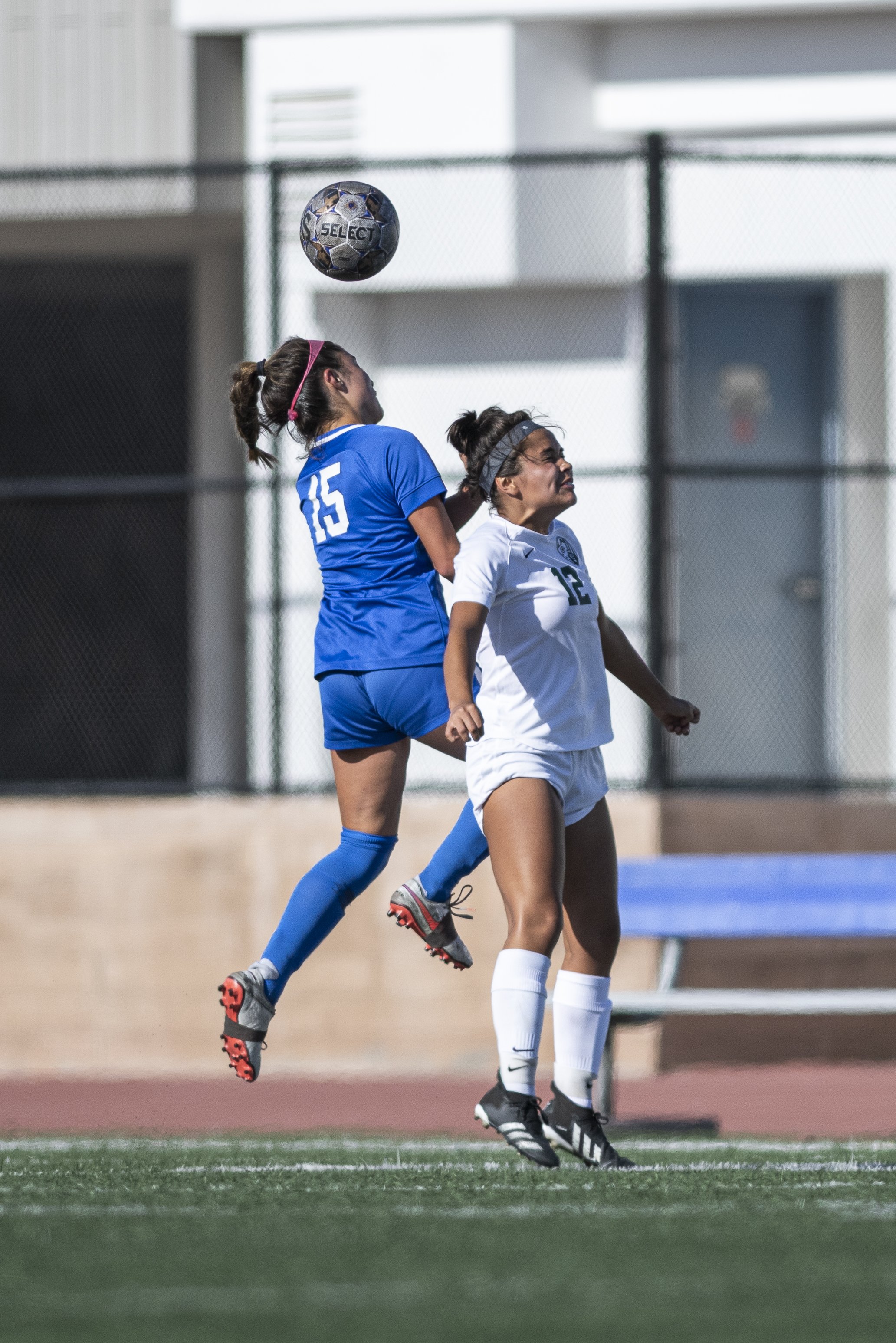  Santa Monica College Corsairs freshman Ali Alban (15) goes head to head with a Valley player Jessica Romero (12) as the ball had been kicked from the corner towards the Corsairs side of the field. (Jon Putman | The Corsair) 