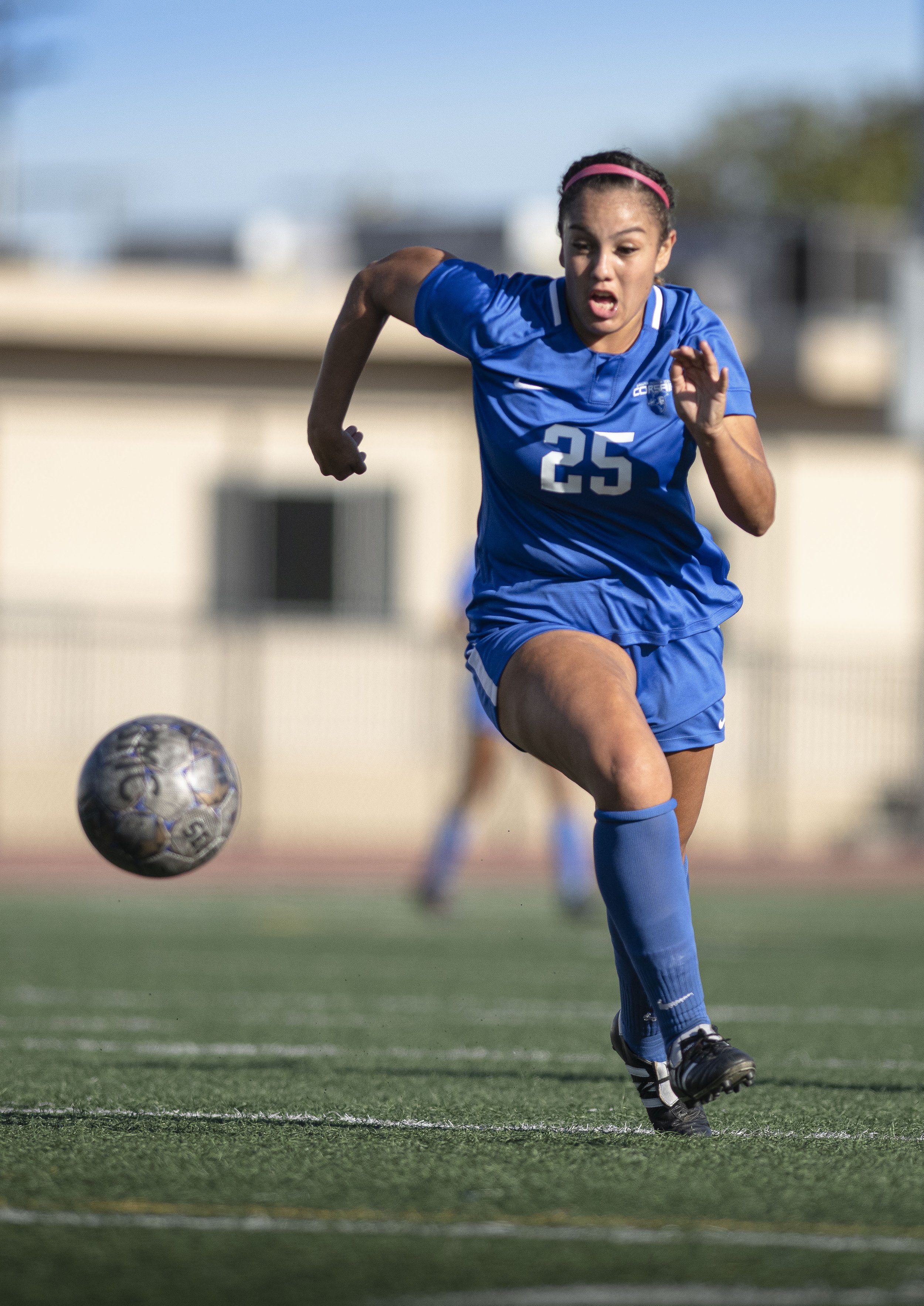  Santa Monica College Corsairs sophomore Cassie Velasquez (25) dribbles the ball past Valley playerse in a desperate attempt to get in a goal before the half. (Jon Putman | The Corsair) 