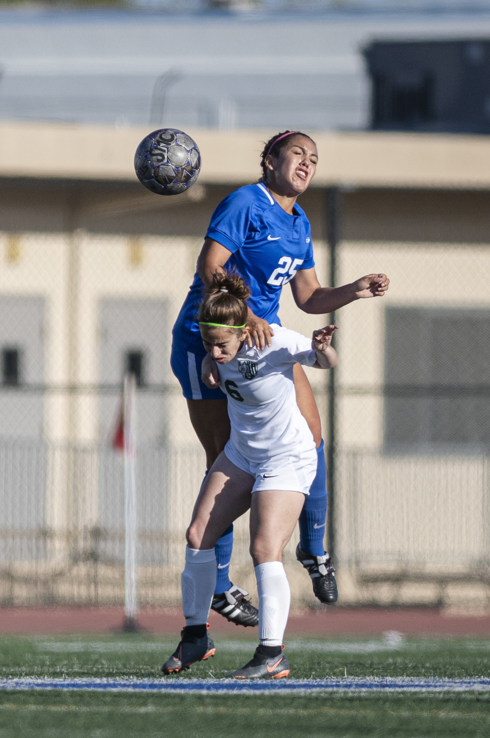  Santa Monica College Corsairs sophomore Cassie Velasquez (25) heads the ball over Selin Hacoian (6) as the Corsairs remain down 1-0 minutes before the time expires. (Jon Putman | The Corsair) 