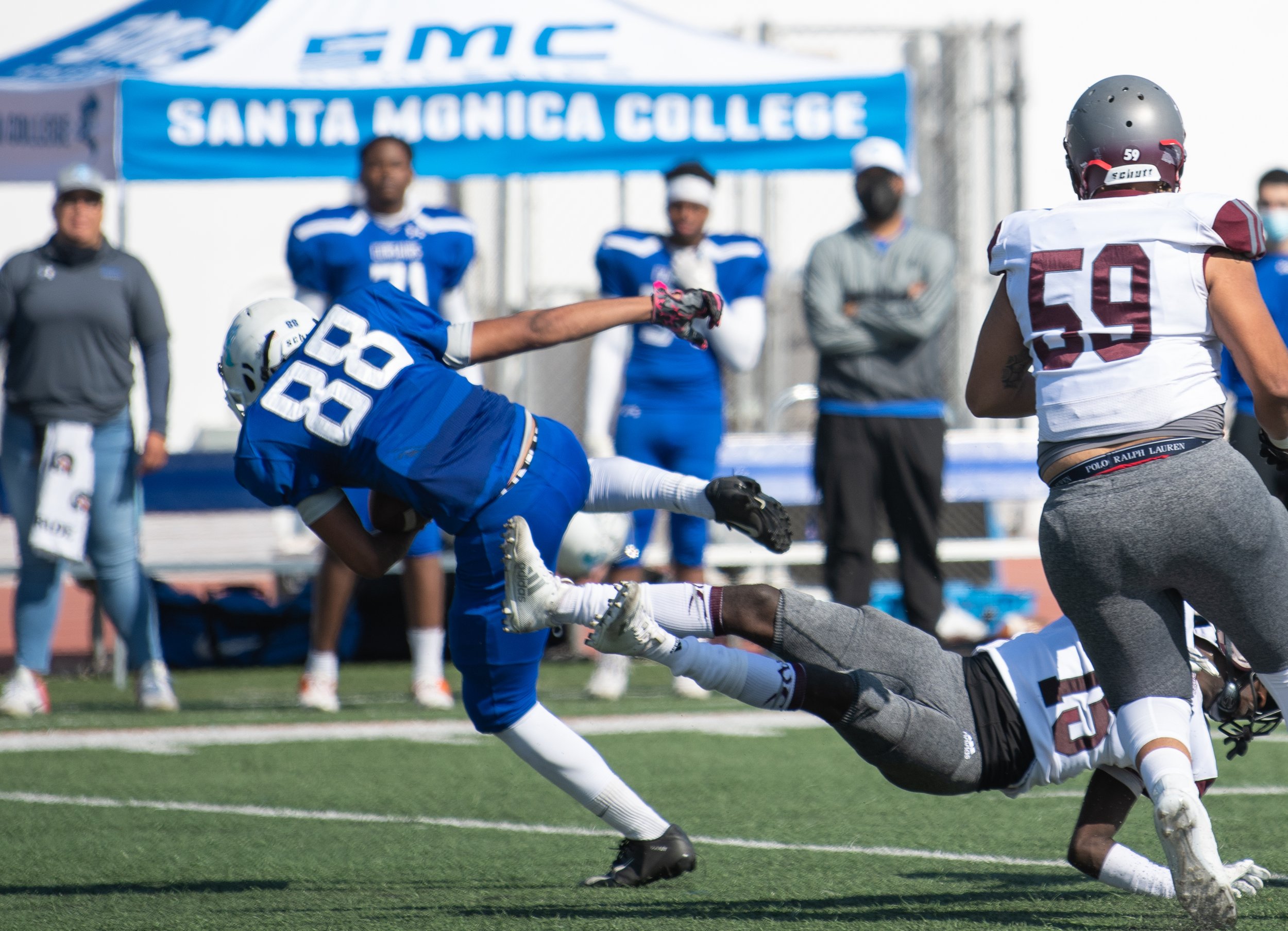  WR David Redden (88) is impacted harshly after a pass completion on Santa Monica College's main campus field in Santa Monica, Calif. on October 23, 2021. The game against Antelope Valley is the first home game since a nine-person COVID infection tha