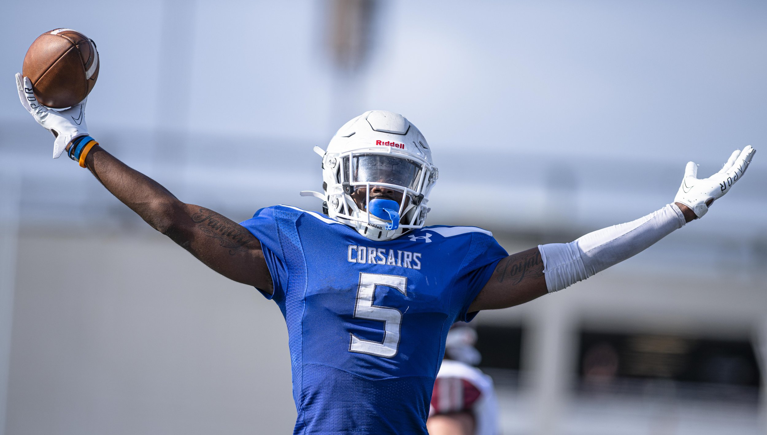  Santa Monica College Corsairs sophomore Wide-receiver Tariq Brown (5) celebrates making the "Touchdown" signal after scoring a crucial go ahead touchdown against Antelope Valley College. (Jon Putman | The Corsair) 