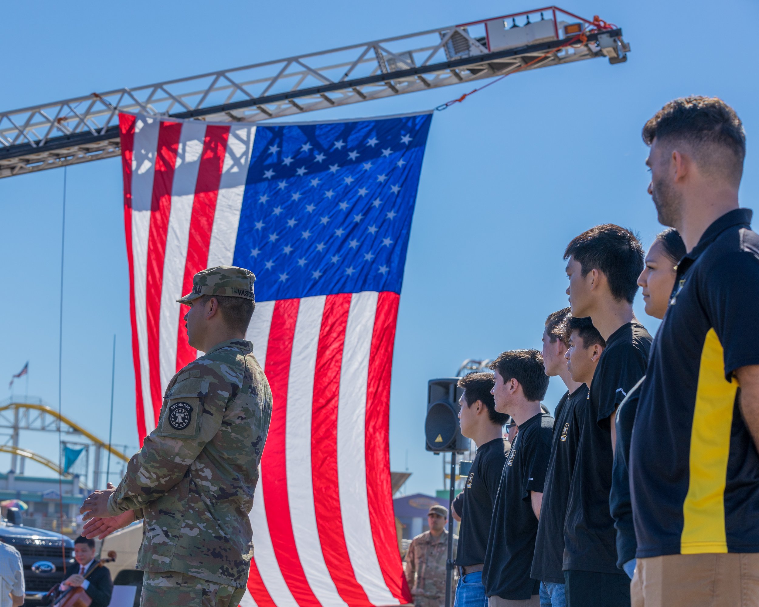  Future Army soldiers watch the Veterans Day commemoration near the Santa Monica Pier in Santa Monica, California on November 11, 2021. (Maxim Elramsisy | The Corsair) 
