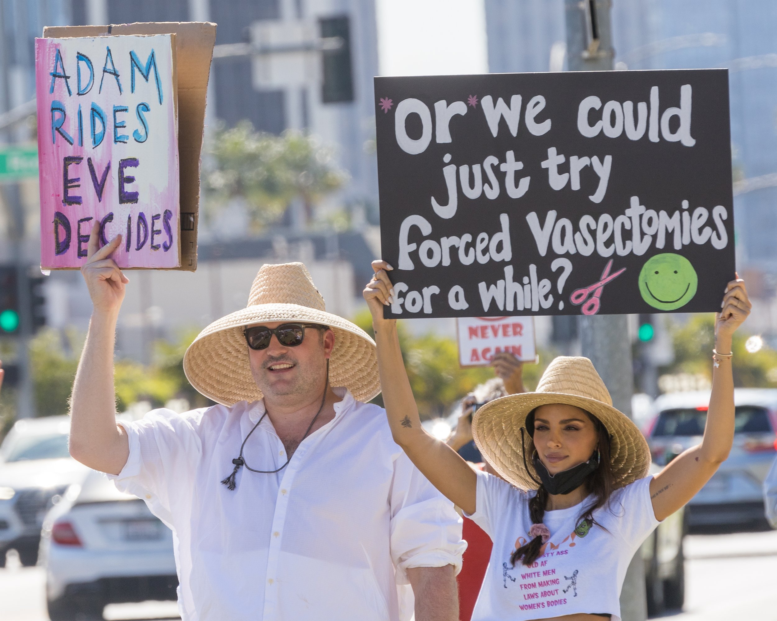  Blake Bachman and Nadia Gray (L-R) at a Womens March event in Beverly Hills, California on Saturday, October, 2 2021.  Abortion rights are a contested issue as states like Texas and Mississippi push laws that restrict womens access to safe, legal, a