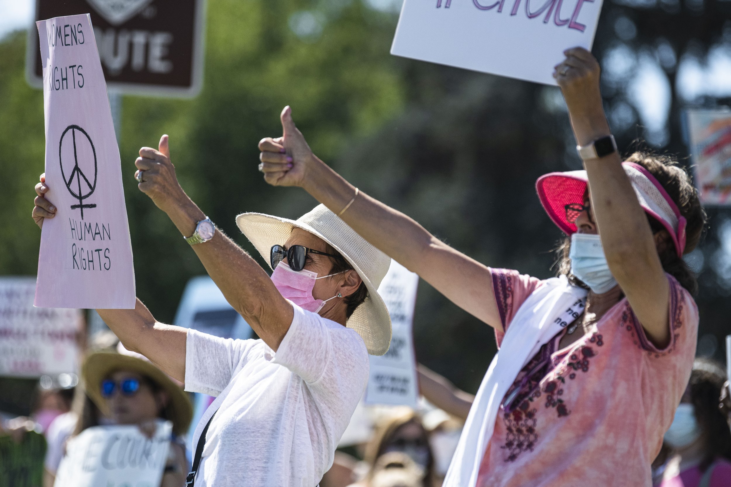  A supporter of the Womens abortion march held at the Beverly Gardens Park located in Beverly Hills, Calif. Sat. Oct. 2, stands with her sign in support of the current abortion situation currently happening in Texas. (Jon Putman | The Corsair) 