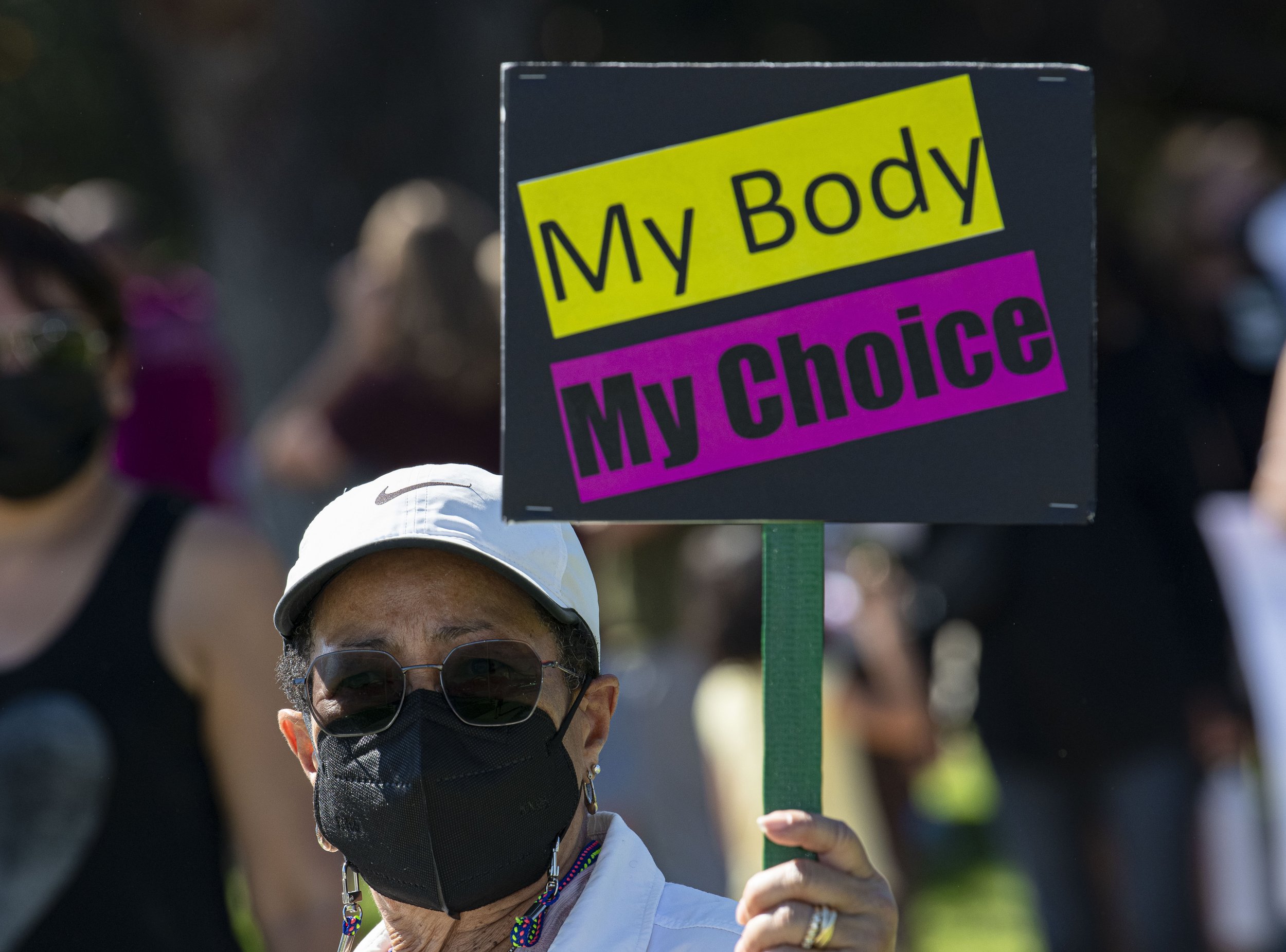  A supporter of the Womens abortion march held at the Beverly Gardens Park located in Beverly Hills, Calif. Sat. Oct. 2, stands with her sign in support of the current abortion situation currently happening in Texas. (Jon Putman | The Corsair) 