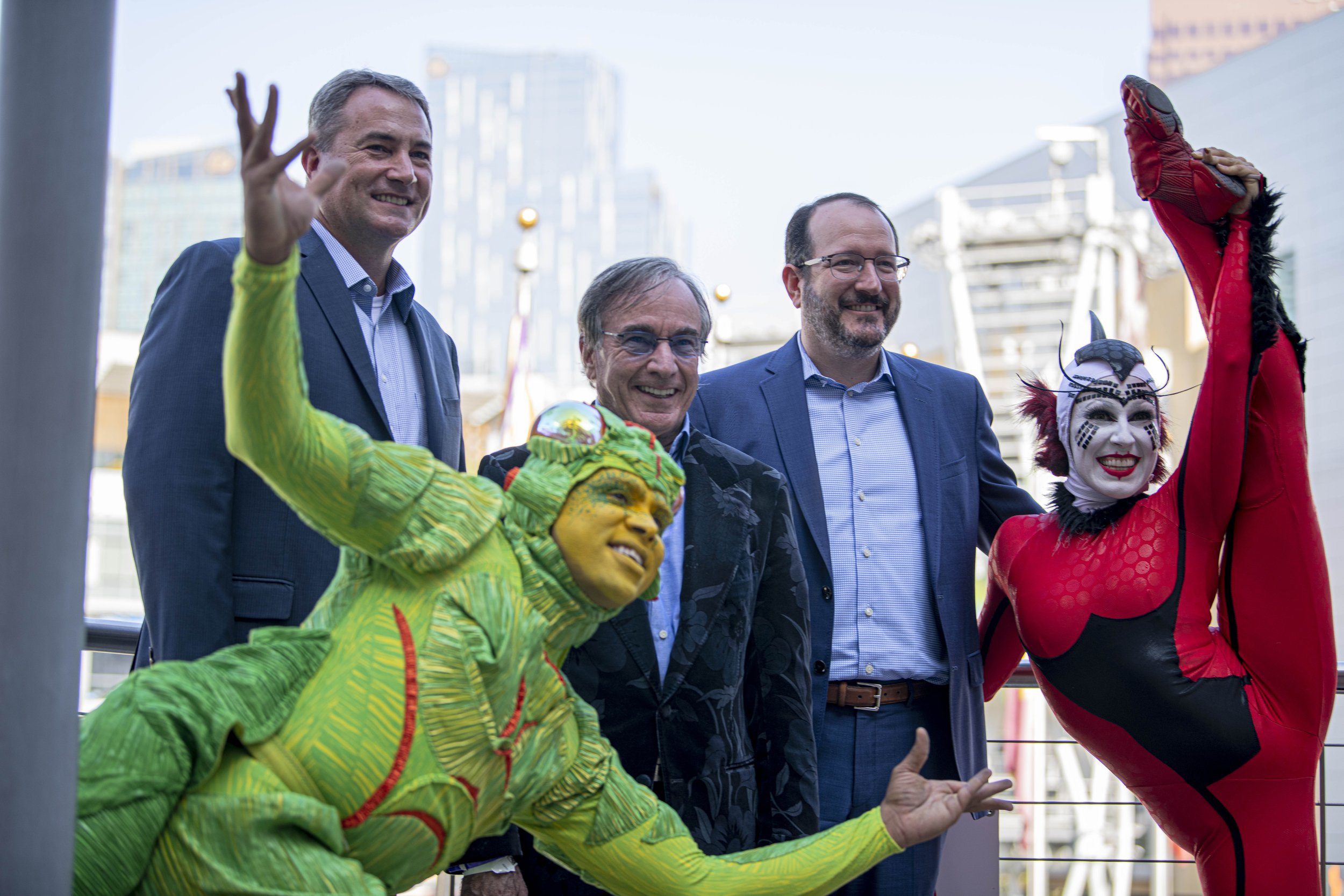  Executive members including President David Lamarre of Cirque du Soleil and a few of their performers pose for a picture on Nov. 10, 2021, after making the announcement that Cirque du Soleil and its new partner OVO entertainment group will be perfor