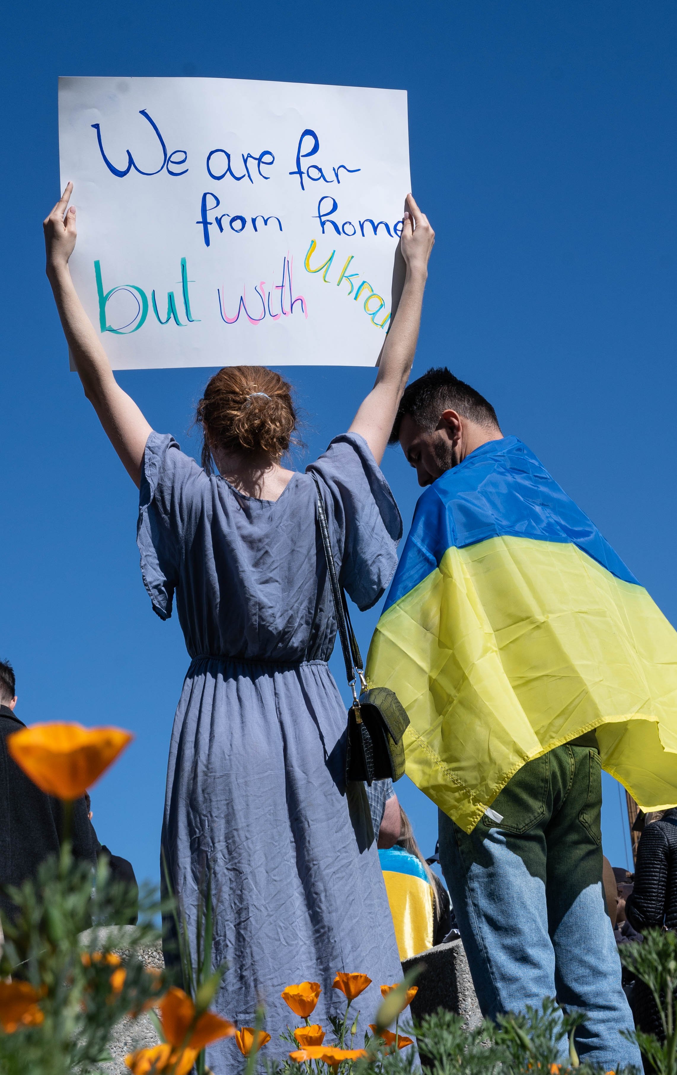  Above, Ukrainian Ivanna Huz holds a sign in front of the Federal Building in Westwood on Tuesday, Feb 22. in Los Angeles. (Karen Vartanian | The Corsair) 